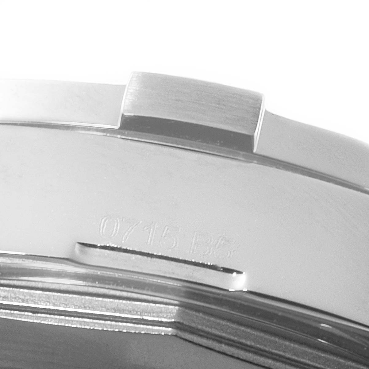 This image shows a close-up of the side and part of the bezel of a Breitling Avenger A3239011-C872-170A Men's Stainless Steel Black Dial A3239011-C872-170A Men's Stainless Steel Black Dial watch, with some engraving visible.