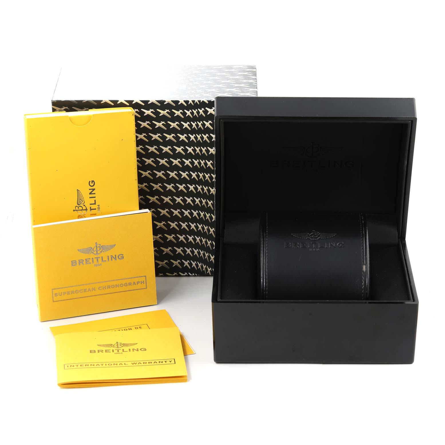The image shows the Breitling Superocean A13341 Men's Stainless Steel Black Dial A13341 Men's Stainless Steel Black Dial watch packaging, including the watch box, manuals, and warranty cards.