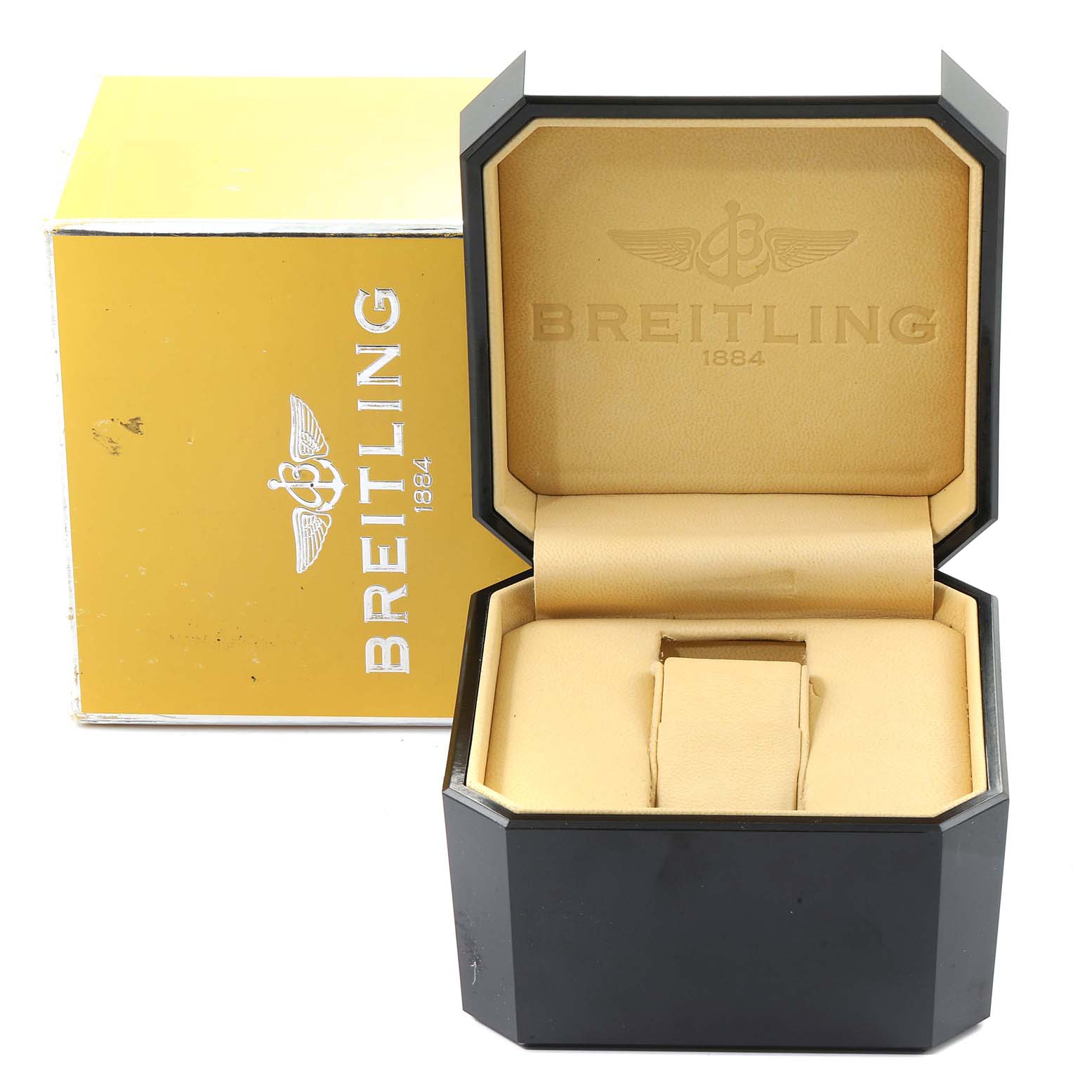 This image shows the Breitling Superocean A13340 Men's Stainless Steel Beige Dial A13340 Men's Stainless Steel Beige Dial watch box and cushion from an angled front view.