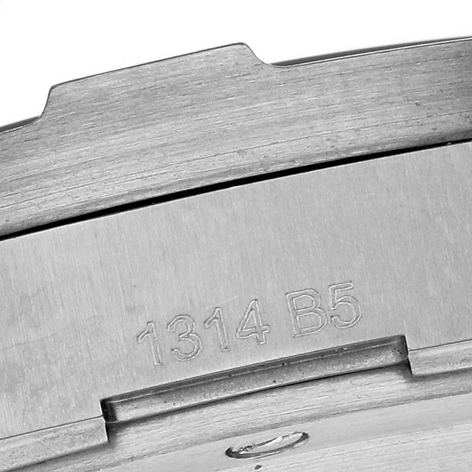 This close-up image shows the side groove and engraved serial number on the bezel of a Breitling Professional Series E79363 Men's Titanium Grey Dial E79363 Men's Titanium Grey Dial watch.