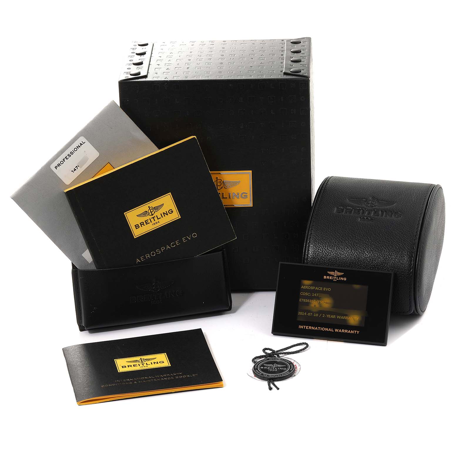 The image shows the packaging and accessories for a Breitling Professional Series E79363 Men's Titanium Grey Dial E79363 Men's Titanium Grey Dial Aerospace Evo watch, including manuals, warranty card, and box.