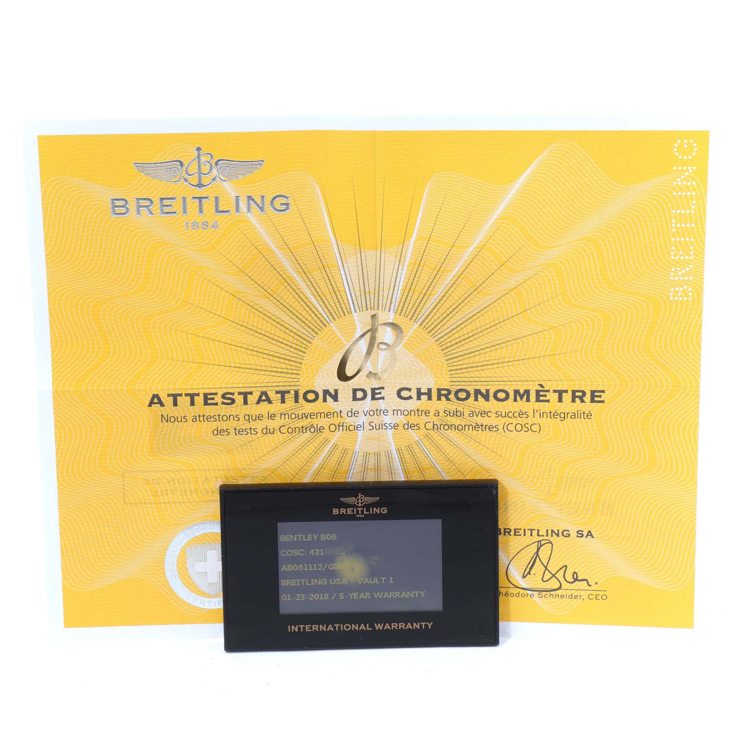 The image shows a Breitling Bentley AB061112-G802-754P Men's Stainless Steel Silver Dial AB061112-G802-754P Men's Stainless Steel Silver Dial model international warranty card and a certificate of chronometer.