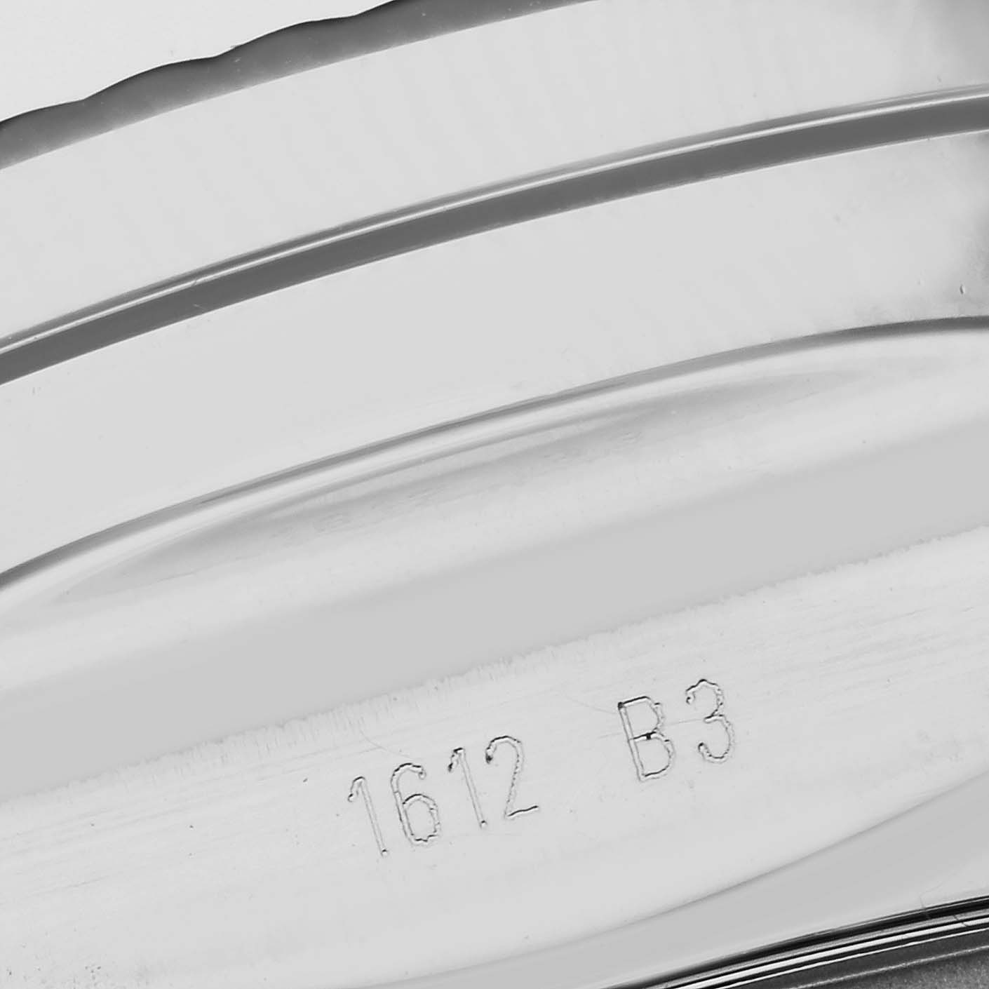 This image shows the engraved serial number on the metal bracelet clasp of the Breitling Bentley A25368 Men's Stainless Steel Black Dial A25368 Men's Stainless Steel Black Dial model watch.