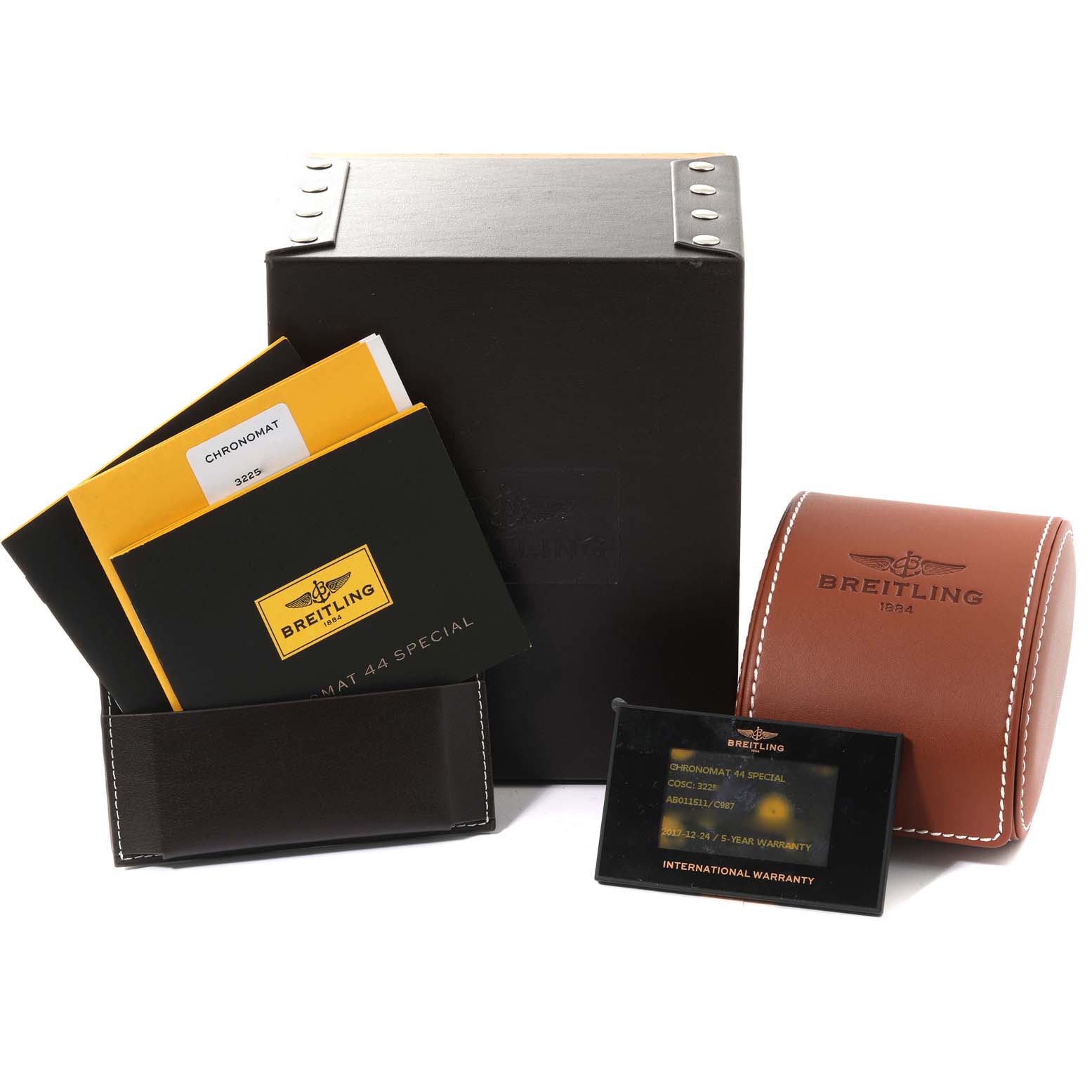 The Breitling Chronomat AB0115 Men
s Stainless Steel Blue Dial AB0115 Men
s Stainless Steel Blue Dial watch accessories include a warranty card, instruction manuals, and a watch case, shown from a front angle.