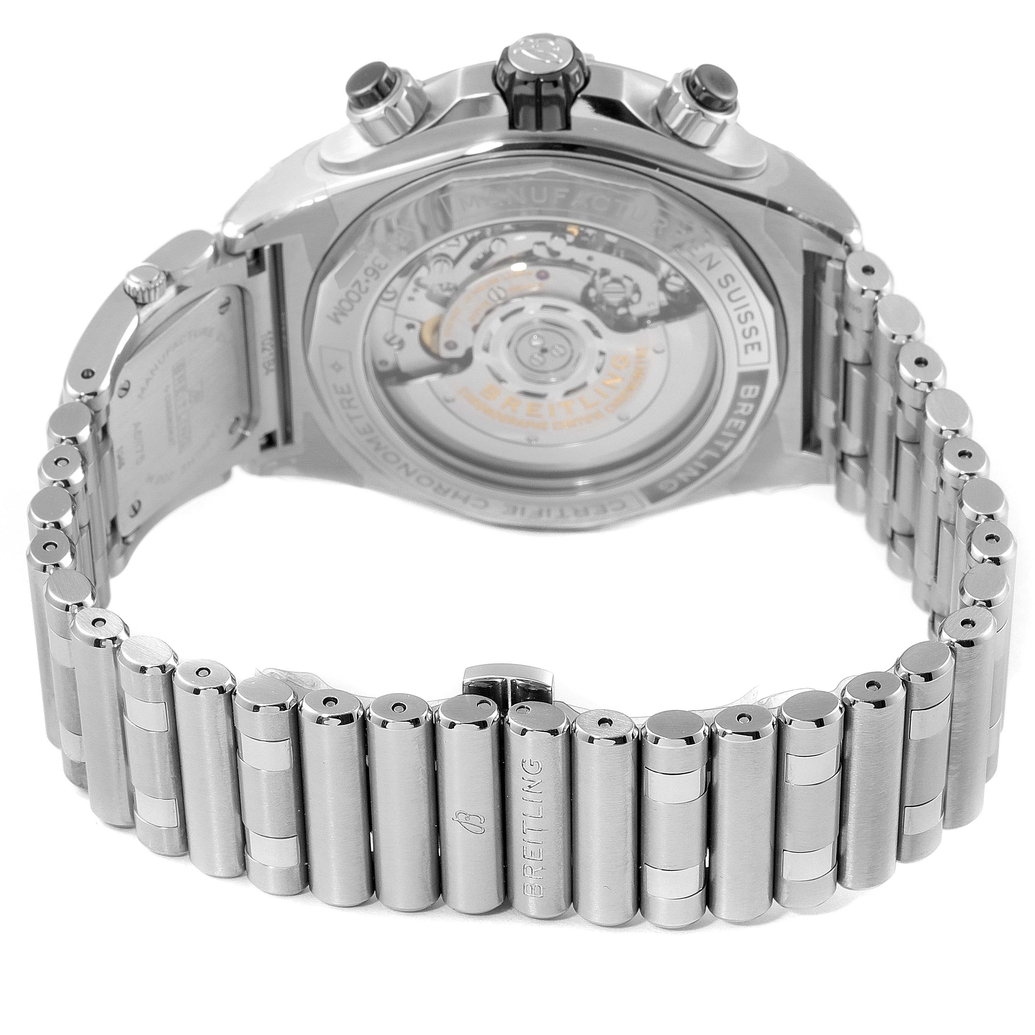 The image shows a rear view of the Breitling Chronomat AB0136251B1A2 Men's Stainless Steel Black Dial AB0136251B1A2 Men's Stainless Steel Black Dial watch, highlighting its open movement case back and metal bracelet.