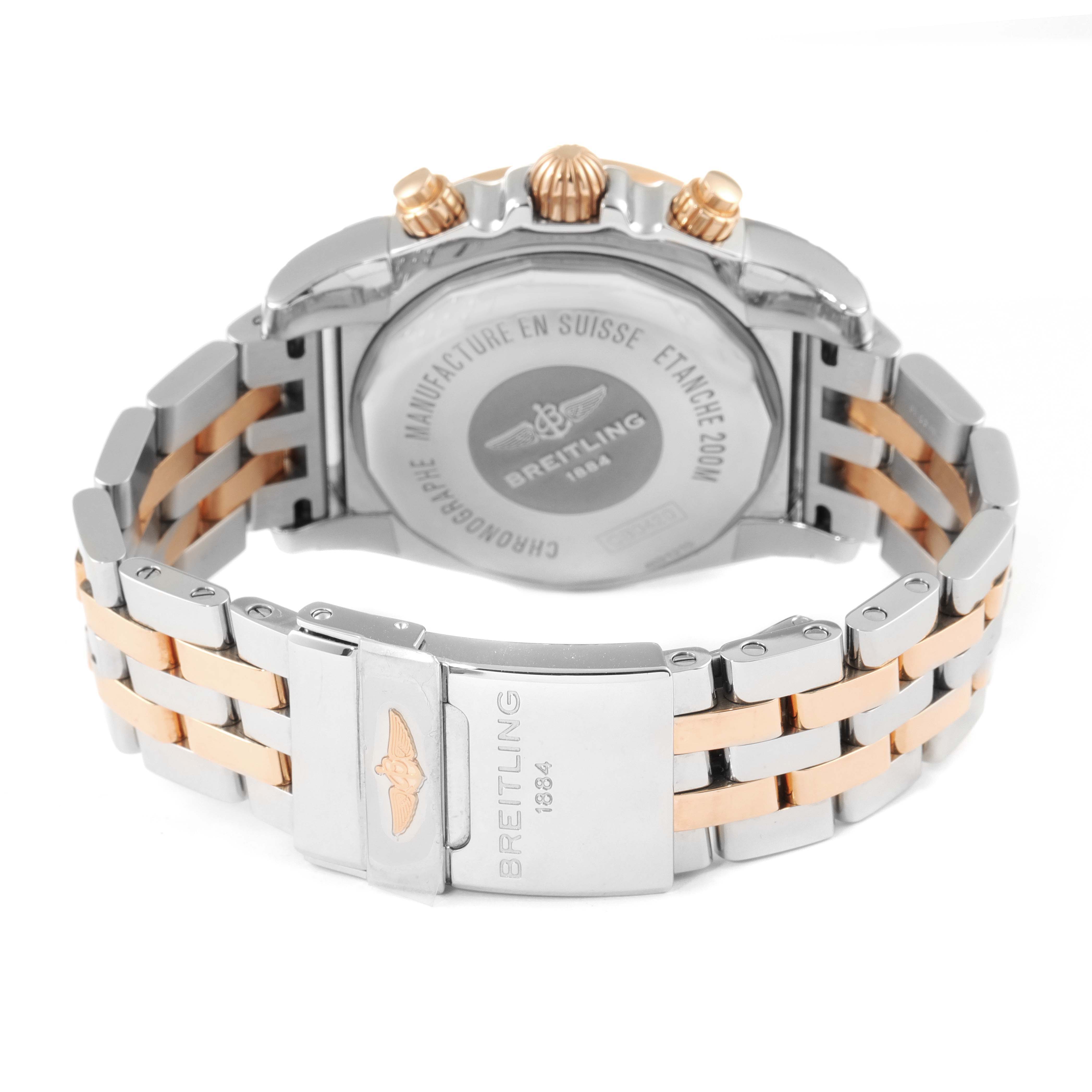 This image shows the back case and bracelet of a Breitling Chronomat CB042012/BB86 Men's Steel and Gold (two tone) Blue Dial CB042012/BB86 Men's Steel and Gold (two tone) Blue Dial watch with a stainless steel and rose gold two-tone design.