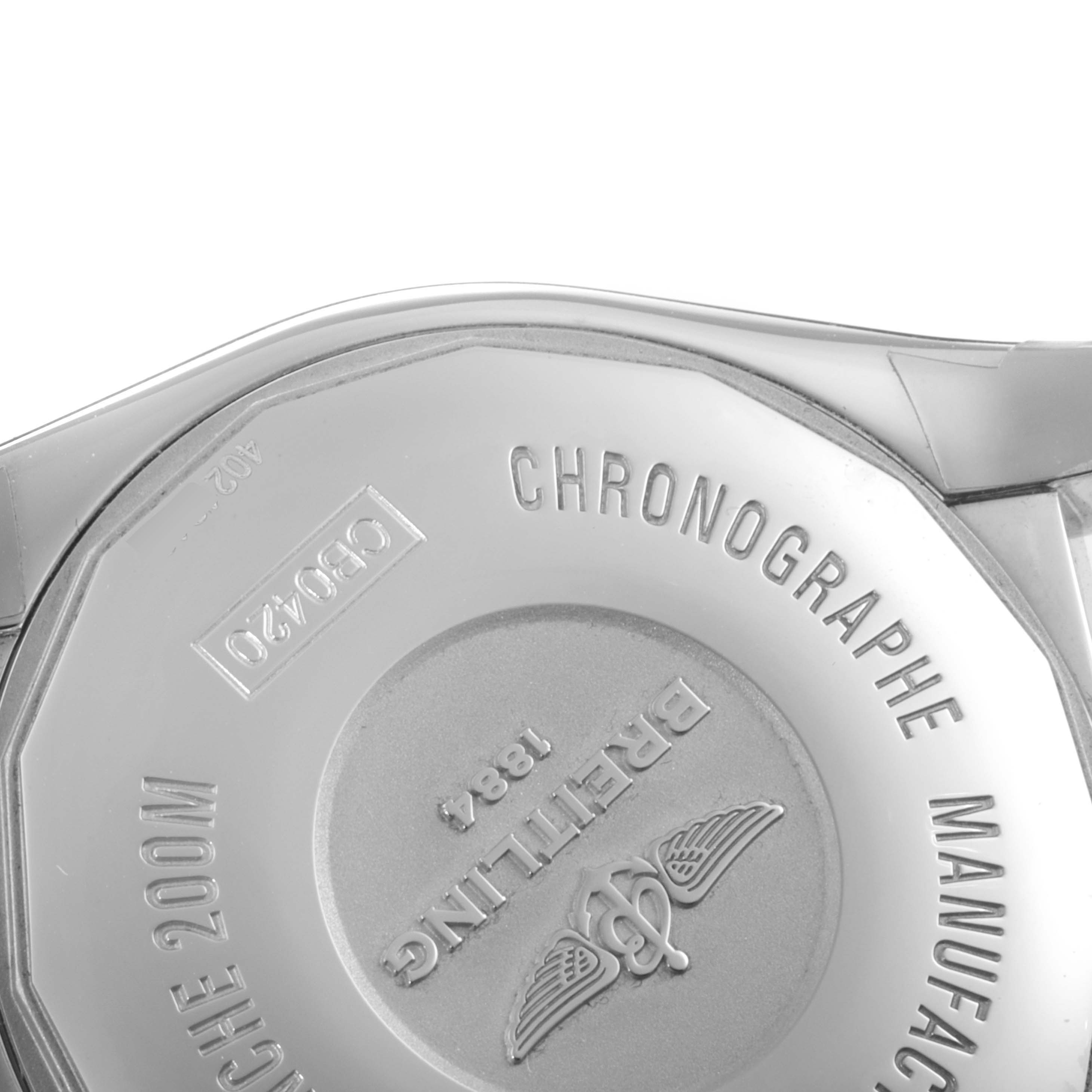 This image shows the back case of a Breitling Chronomat CB042012/BB86 Men's Steel and Gold (two tone) Blue Dial CB042012/BB86 Men's Steel and Gold (two tone) Blue Dial watch at a close-up angle.