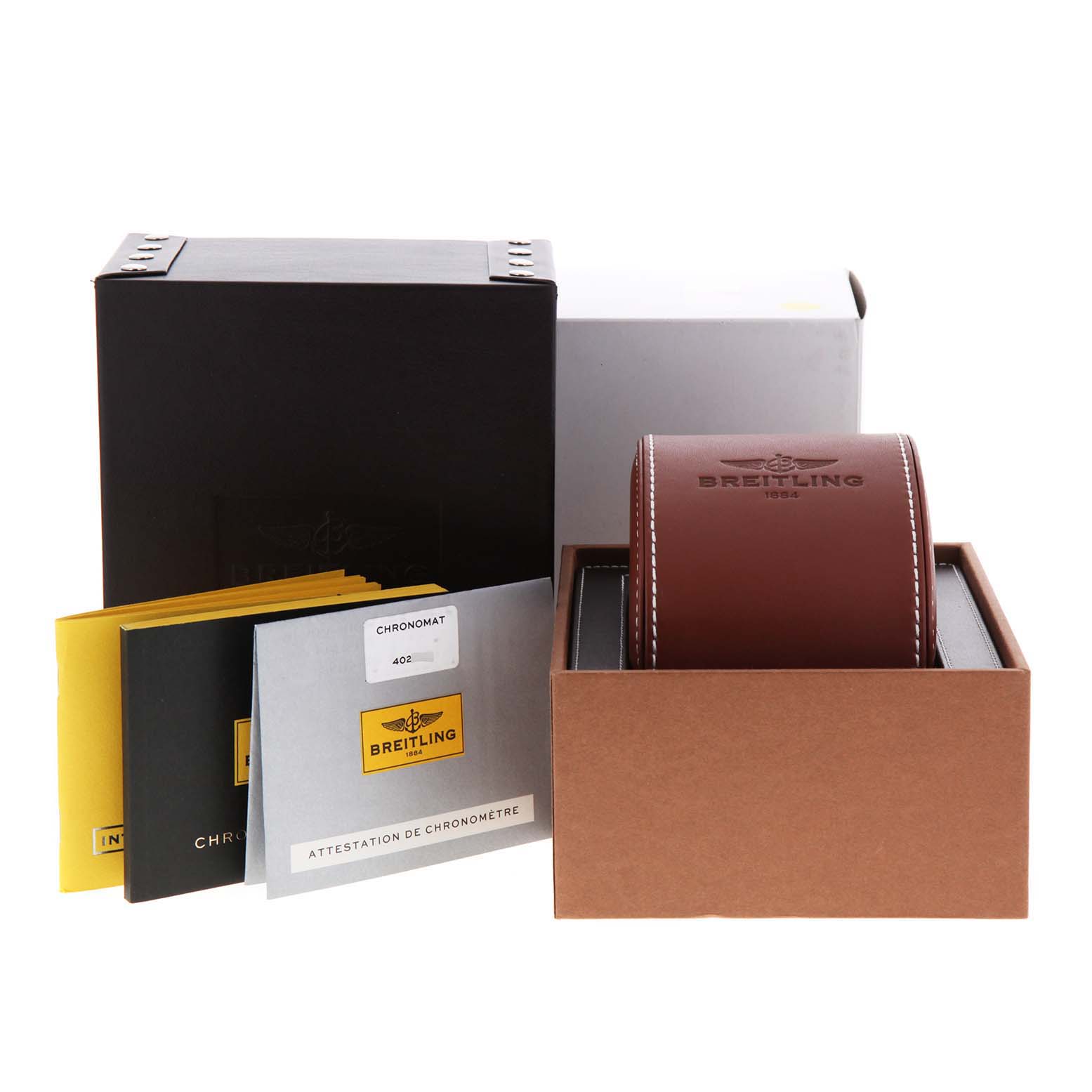 The image shows the Breitling Chronomat CB042012/BB86 Men's Steel and Gold (two tone) Blue Dial CB042012/BB86 Men's Steel and Gold (two tone) Blue Dial watch packaging, including the outer box, inner case, and accompanying booklets.