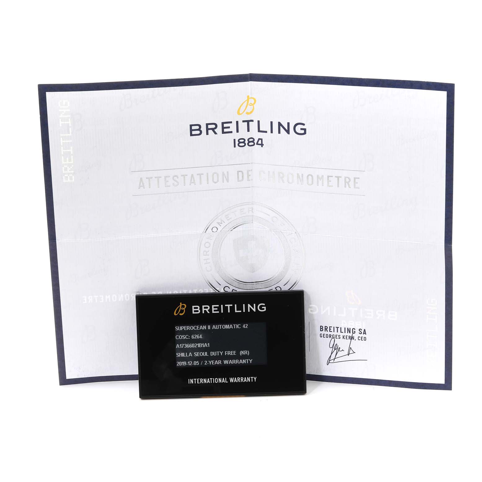 The image shows the international warranty card and chronometer certification for a Breitling Superocean A17366 Men's Stainless Steel Black Dial A17366 Men's Stainless Steel Black Dial watch.