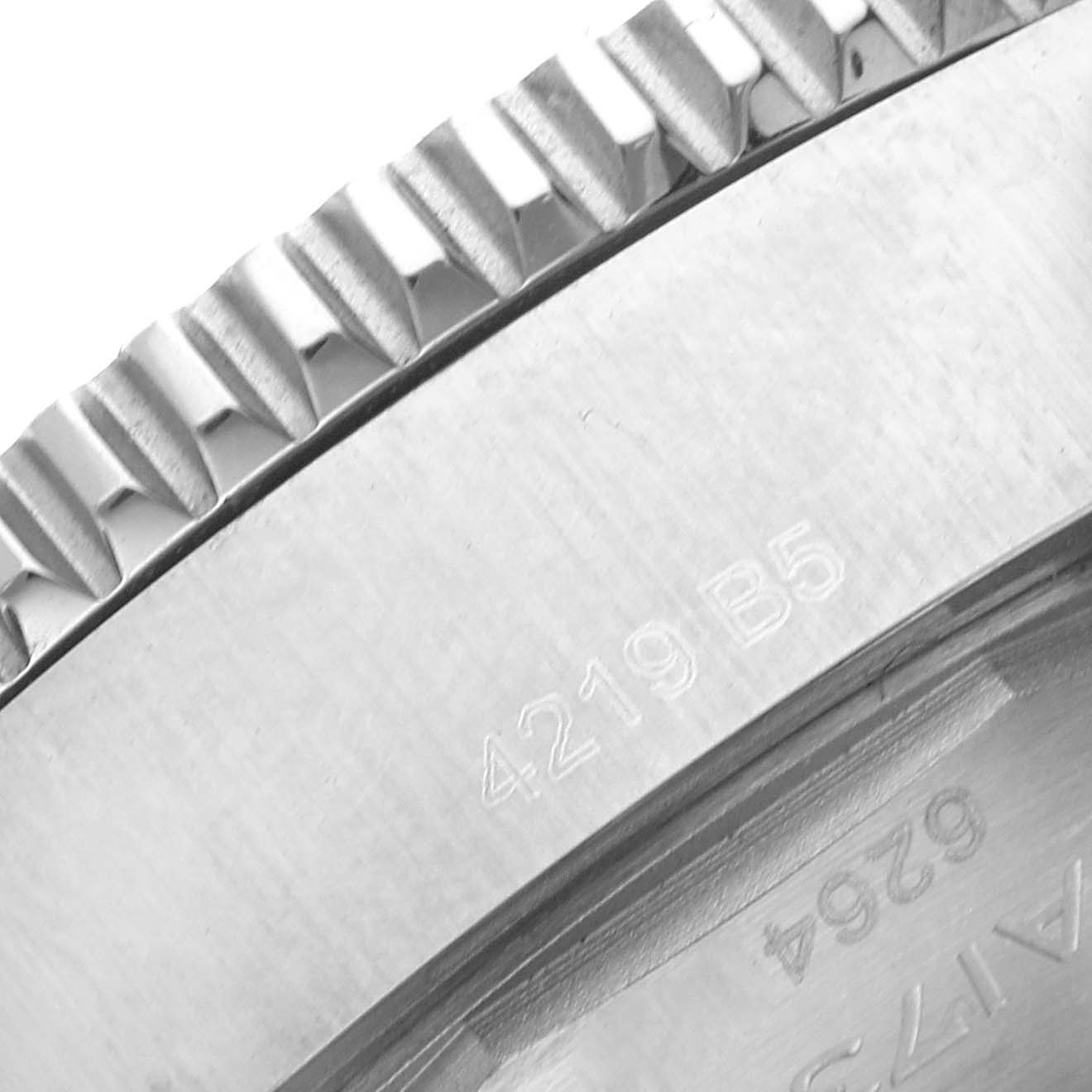 The image shows a close-up of the bezel and engraved serial number on a Breitling Superocean A17366 Men's Stainless Steel Black Dial A17366 Men's Stainless Steel Black Dial watch.
