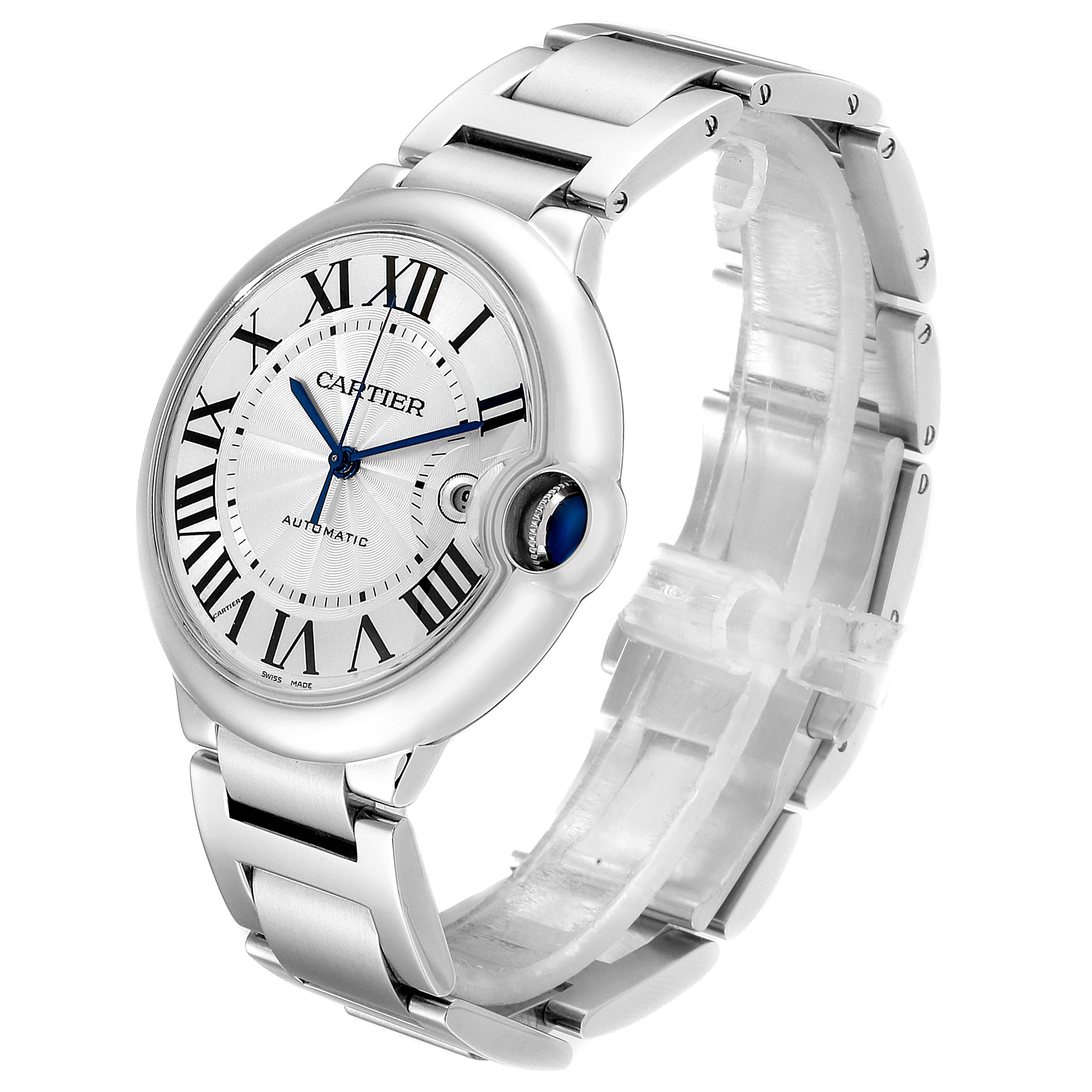 The image shows a Cartier Ballon Bleu W69012Z4 Men's Stainless Steel Silver Dial W69012Z4 Men's Stainless Steel Silver Dial watch angled to display its face, bracelet, and crown with a blue cabochon.