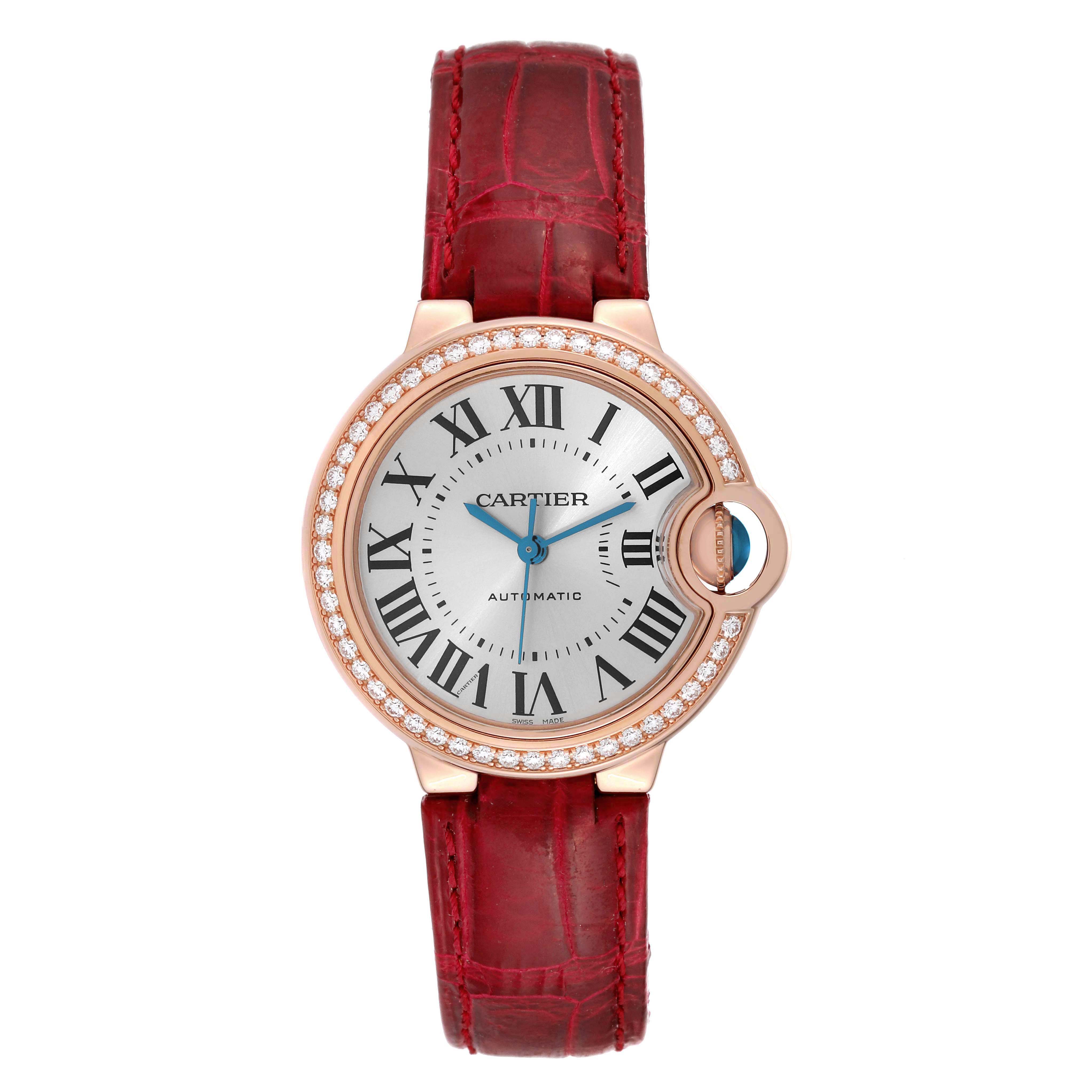 The Cartier Ballon Bleu WJBB0033 Women's Rose Gold Silver Dial watch is shown from the front, displaying its round face, Roman numerals, and red leather strap.