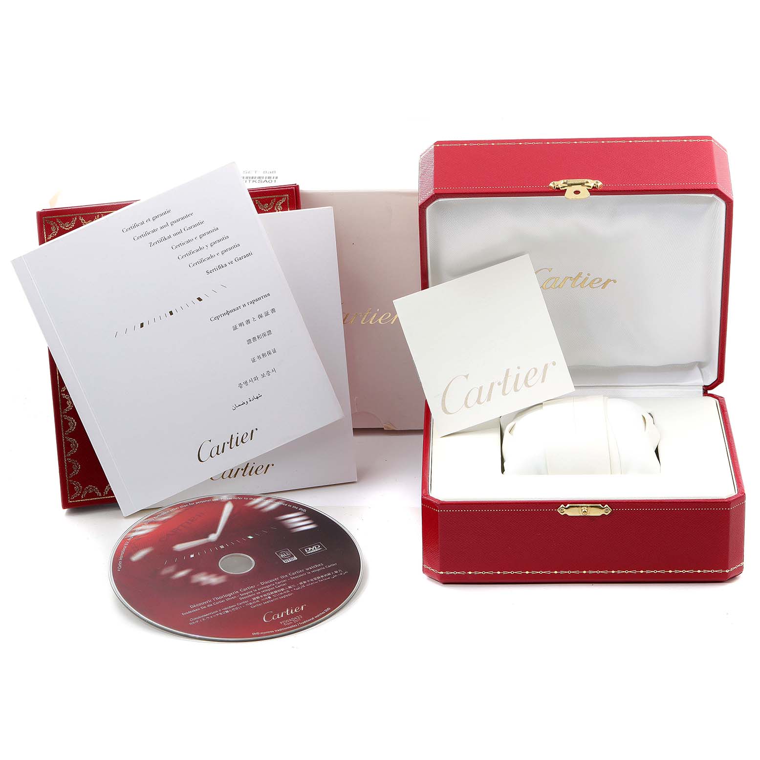 The image shows accessories for a Ballon Bleu de Cartier watch, including a red box, booklets, and a DVD.