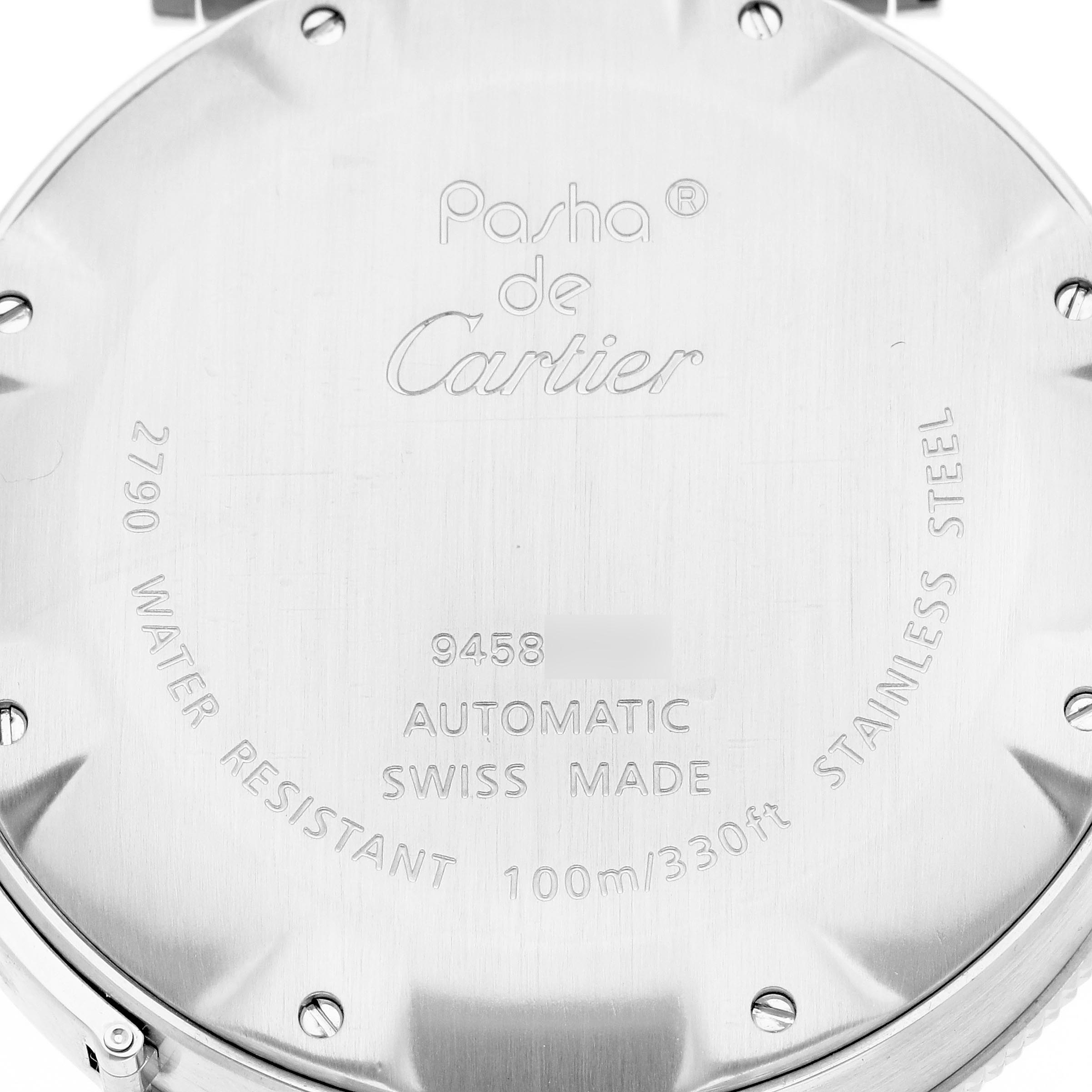 The image shows the back of a Pasha de Cartier watch, highlighting its branding, model details, and water resistance information.