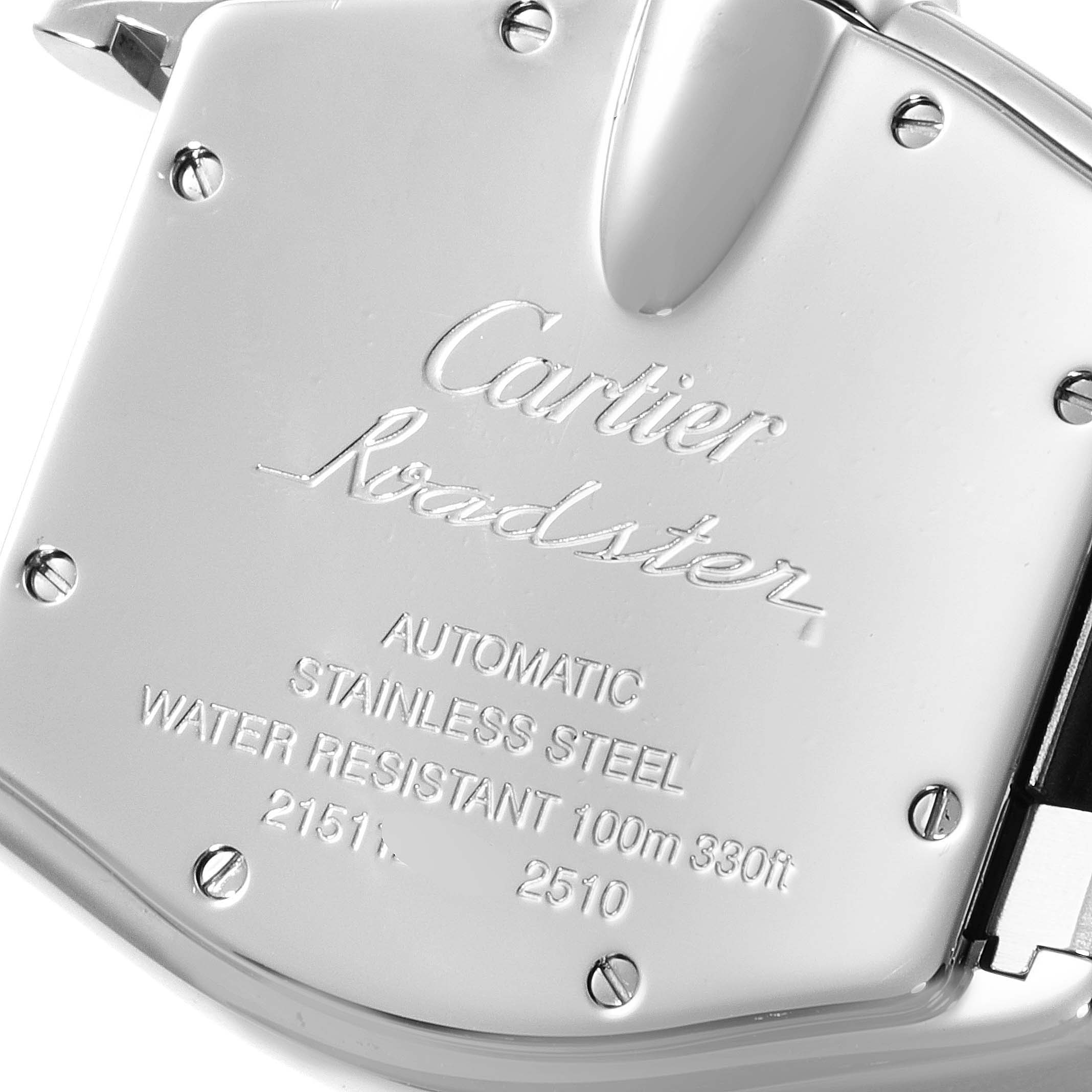 This image shows the case back of a Cartier Roadster W62000V3 Men
s Stainless Steel Silver Dial W62000V3 Men
s Stainless Steel Silver Dial watch featuring engraved details and screws.