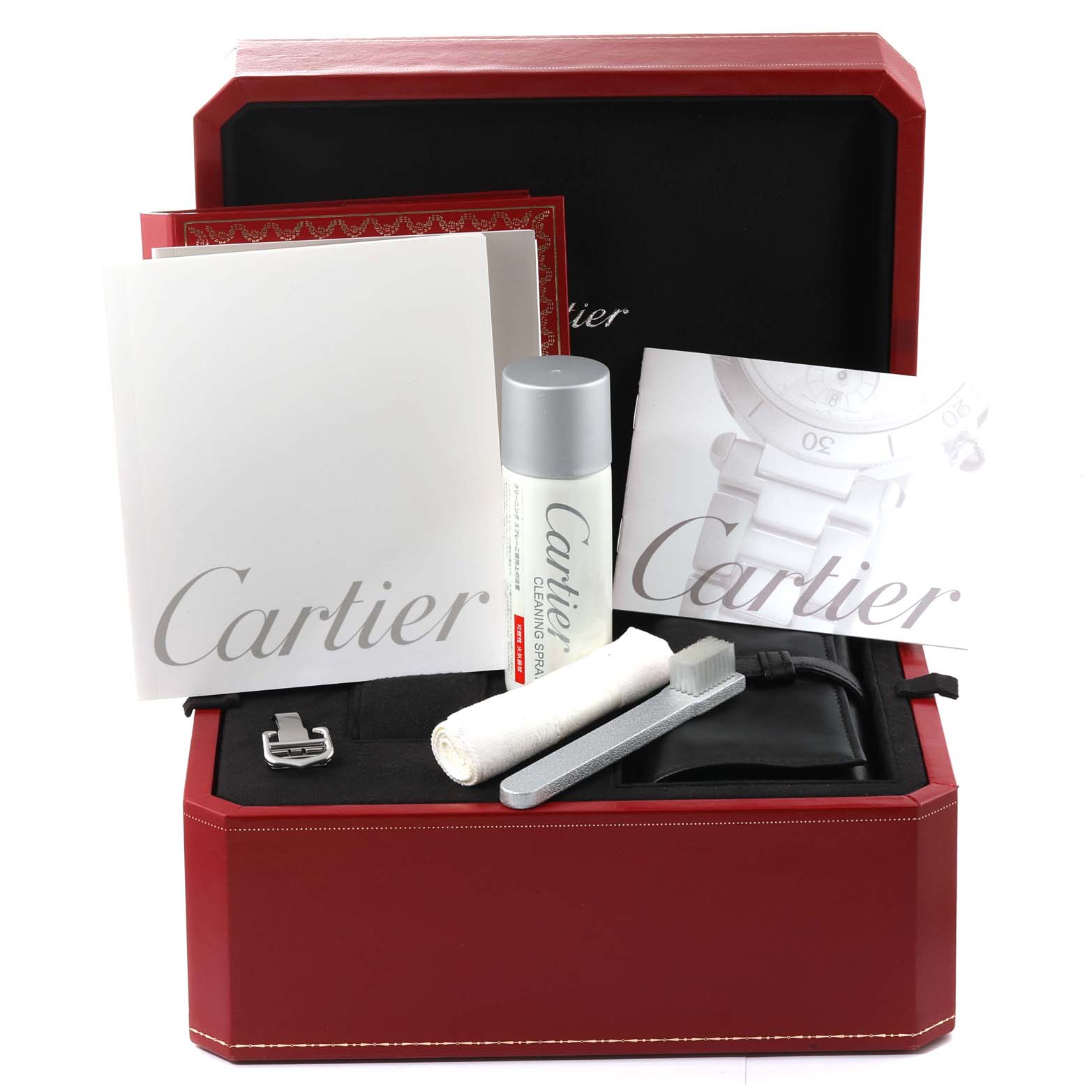 The image shows a Cartier Roadster W62002V3 Men's Stainless Steel Black Dial W62002V3 Men's Stainless Steel Black Dial watch box with cleaning accessories, manuals, and a spare strap.