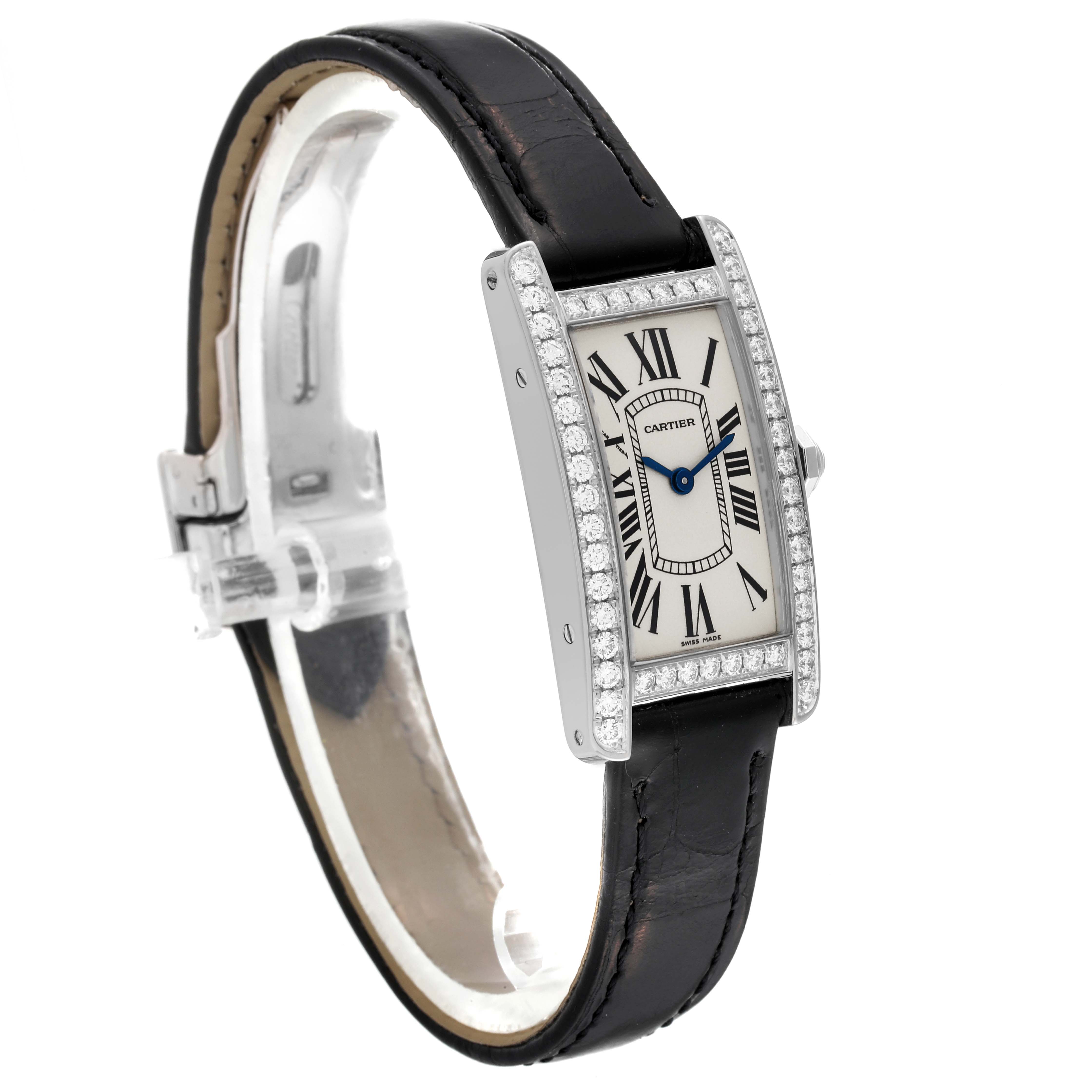 This image shows a Cartier Tank Americaine WB707331 Women's White Gold Silver Dial WB707331 Women's White Gold Silver Dial watch at a slight angle, displaying the face, diamond-set bezel, and leather strap.