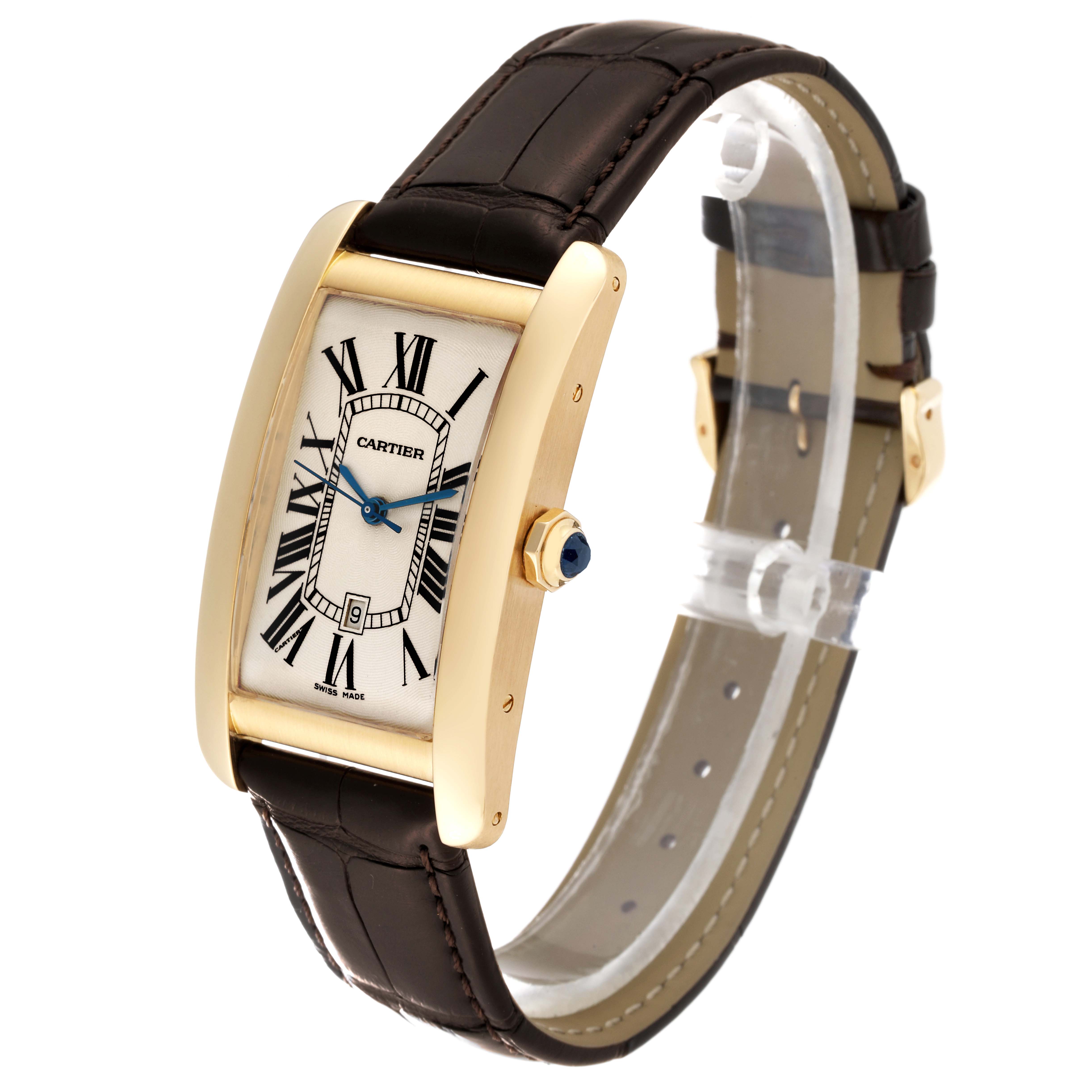 The image shows a Cartier Tank Américaine watch from a three-quarter angle, highlighting the dial, bezel, crown, and leather strap.
