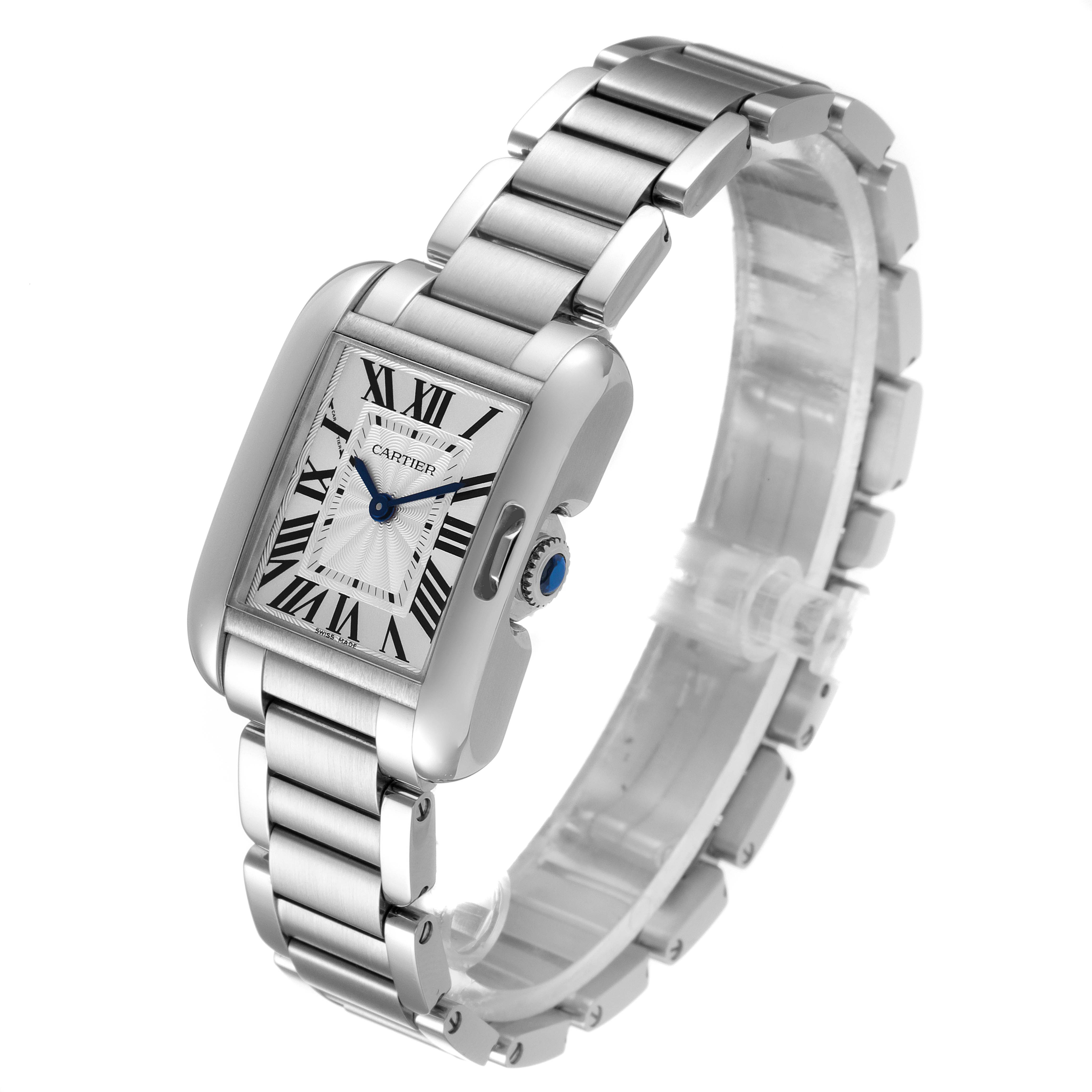 The Tank Anglaise by Cartier is shown at an oblique angle, displaying its rectangular face, bracelet, and crown with a blue cabochon.