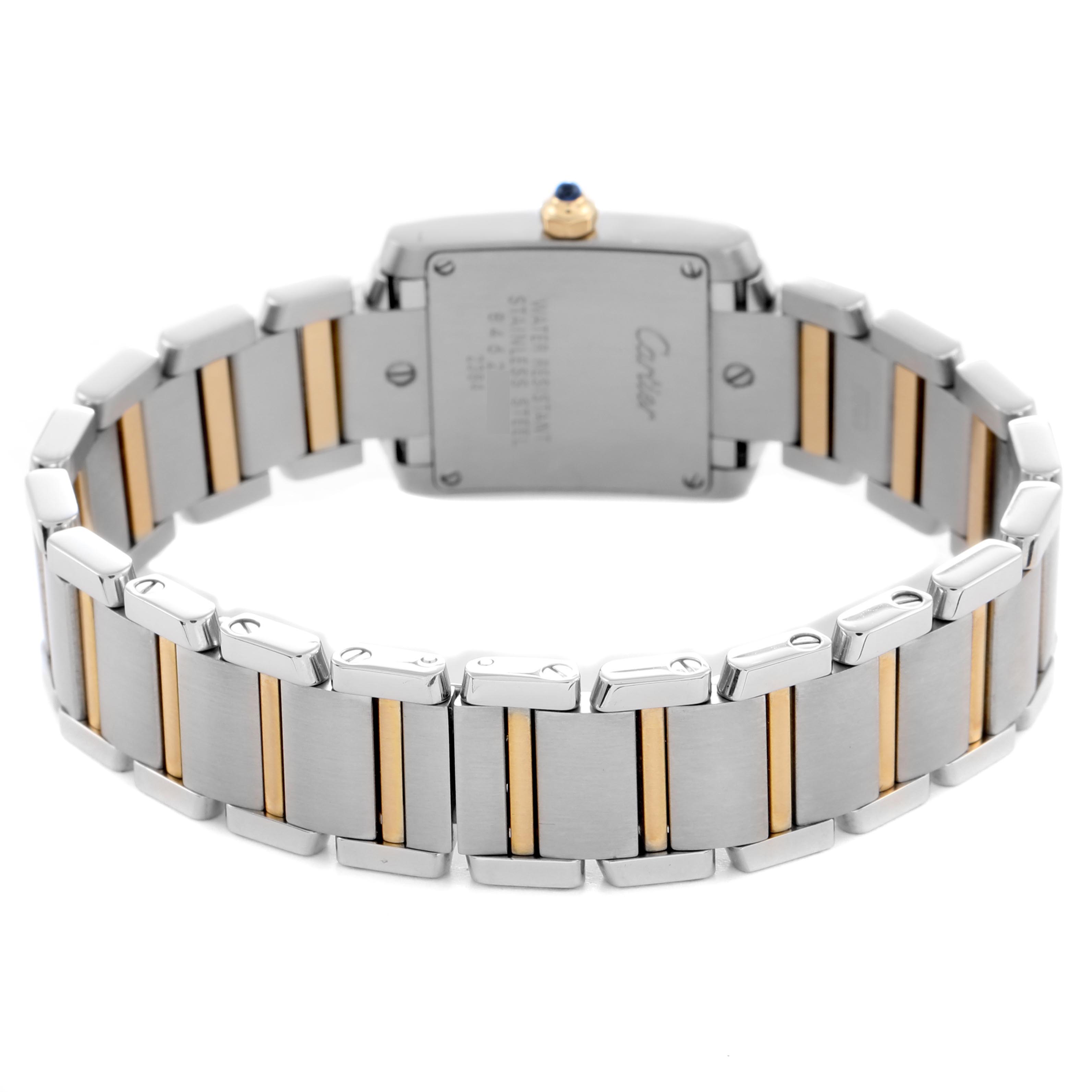 The image shows the back view of a Cartier Tank Francaise W51007Q4 Women's Steel and Gold (two tone) Silver Dial W51007Q4 Women's Steel and Gold (two tone) Silver Dial watch, highlighting the bracelet with gold and silver links.