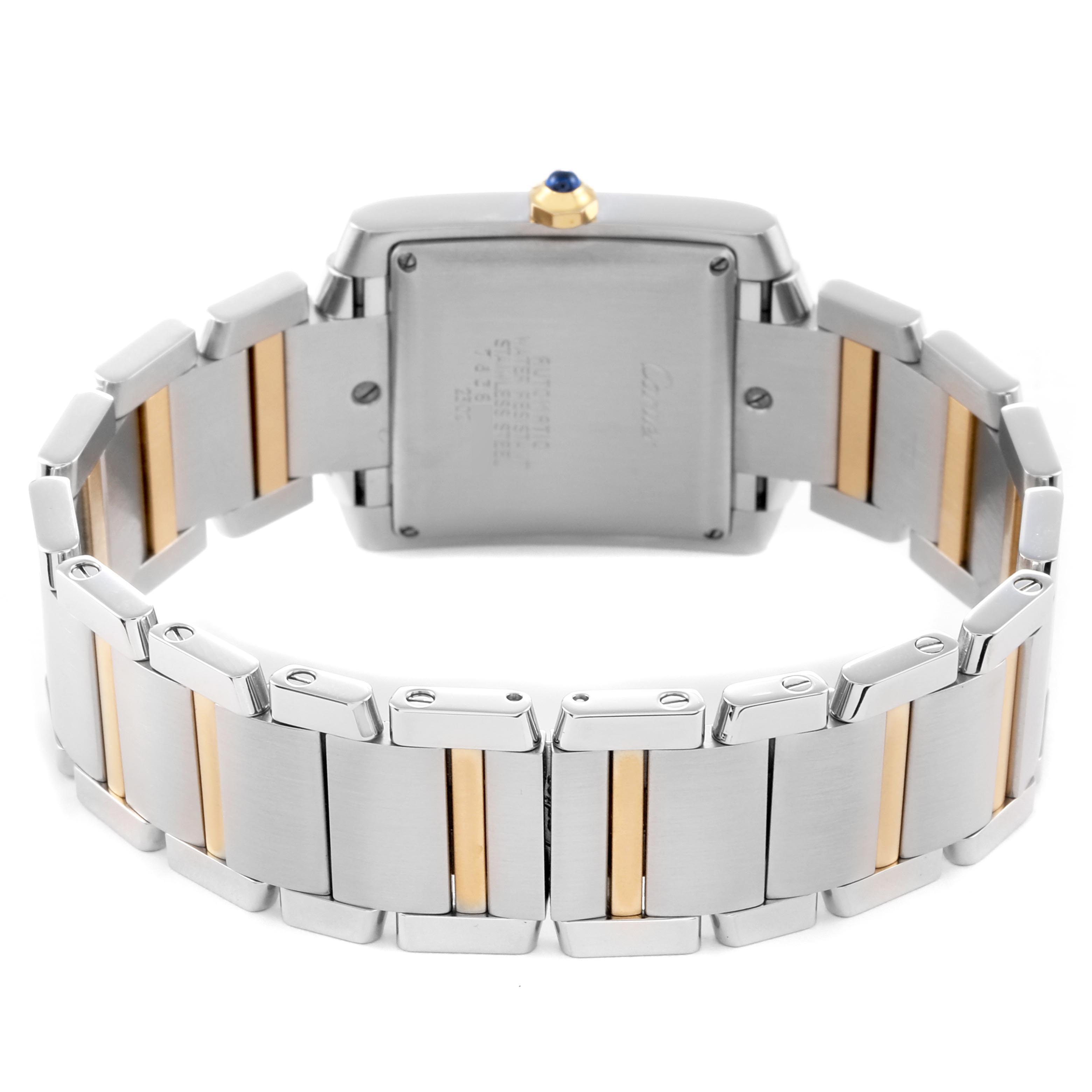 The Cartier Tank Francaise W51005Q4 Men's Steel and Gold (two tone) Silver Dial W51005Q4 Men's Steel and Gold (two tone) Silver Dial watch is shown from the back angle, highlighting the case back, bracelet, and gold crown.