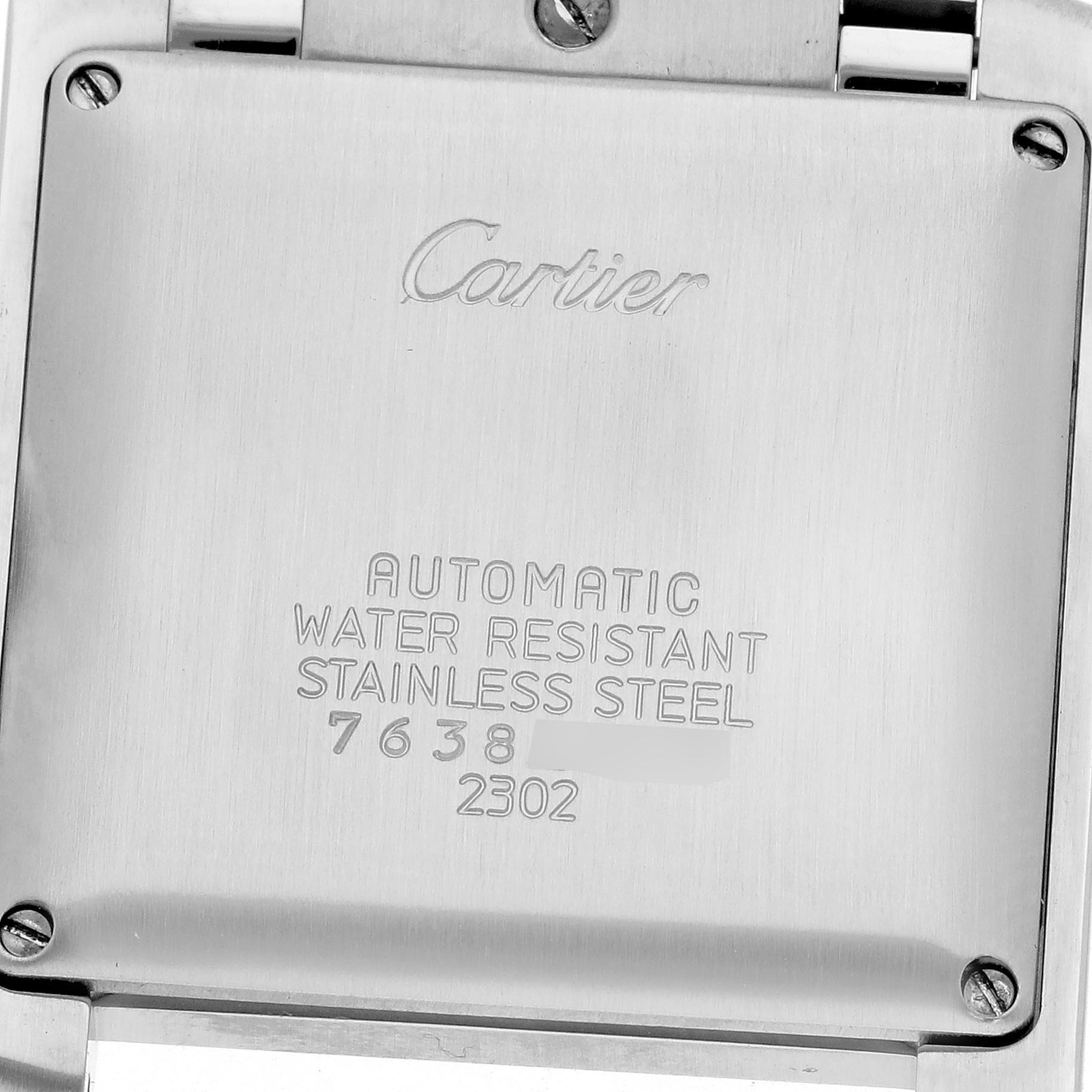 The image shows the back case of a Cartier Tank Francaise W51005Q4 Men's Steel and Gold (two tone) Silver Dial W51005Q4 Men's Steel and Gold (two tone) Silver Dial watch, emphasizing the engraved details and screws.