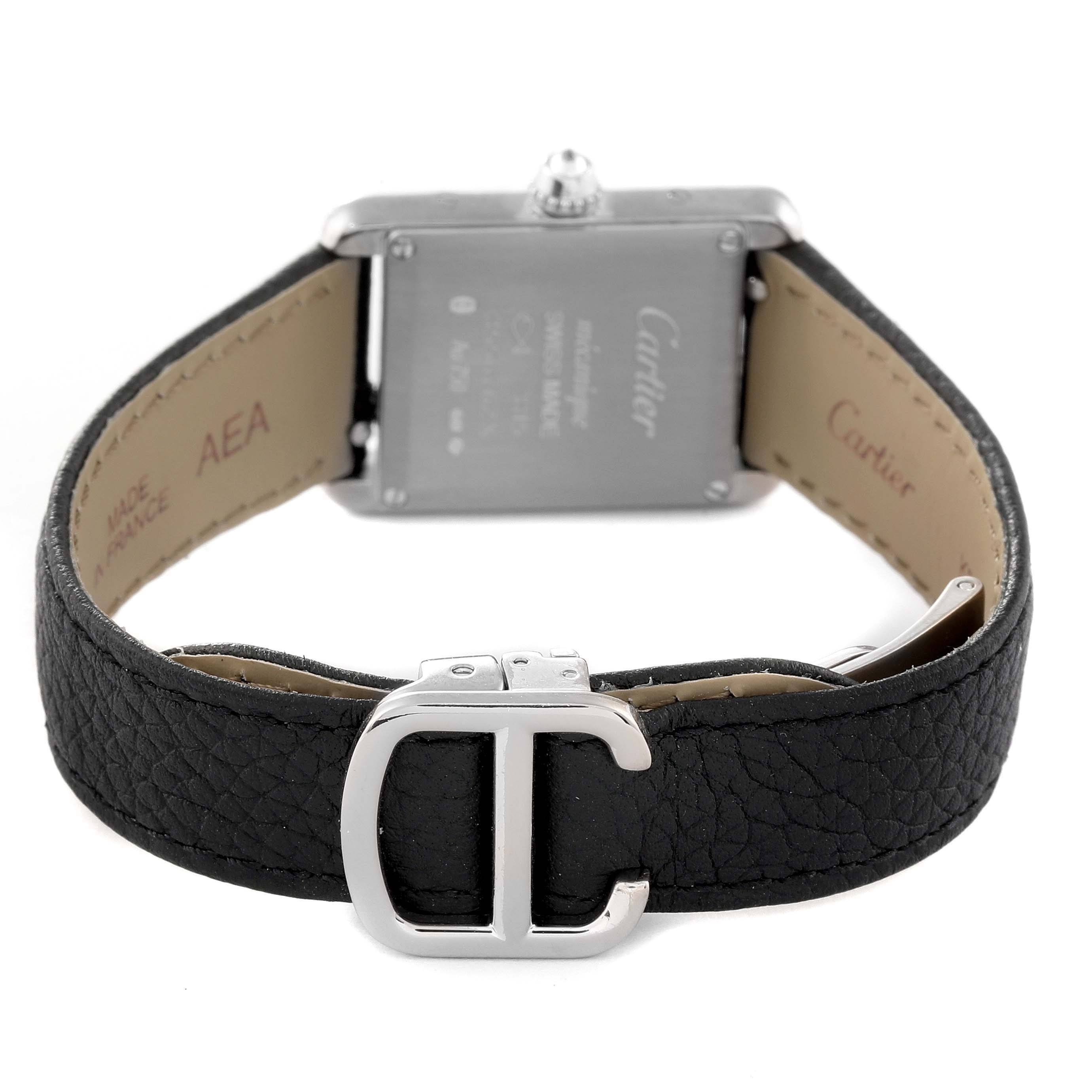 The image shows the back view of a Cartier Tank Louis WJTA0011 Women's White Gold Silver Dial WJTA0011 Women's White Gold Silver Dial model watch, highlighting its leather strap and buckle.