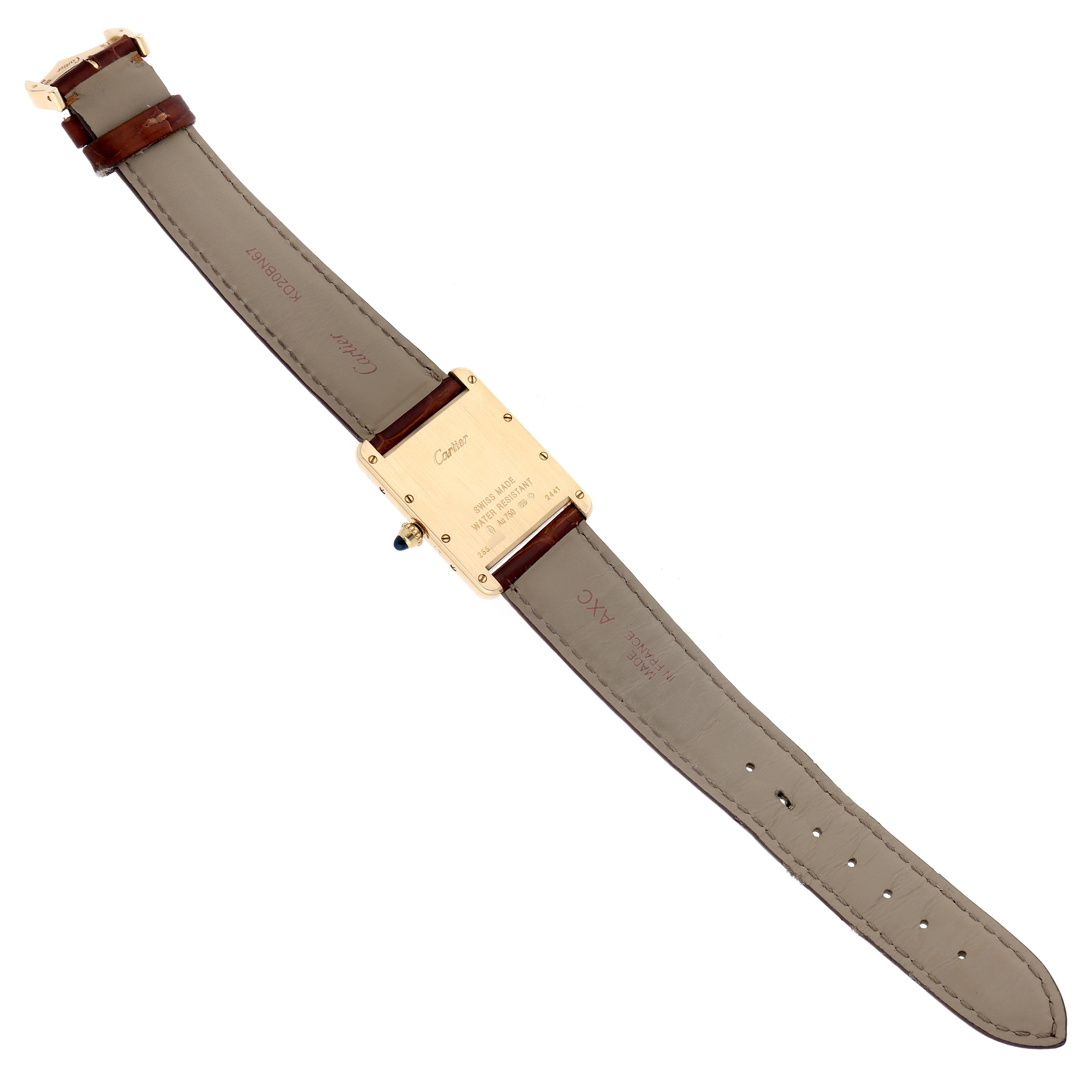 The image shows the back view of a Cartier Tank Louis W1529756 Men's Yellow Gold Silver Dial W1529756 Men's Yellow Gold Silver Dial watch, highlighting the case back and leather strap.