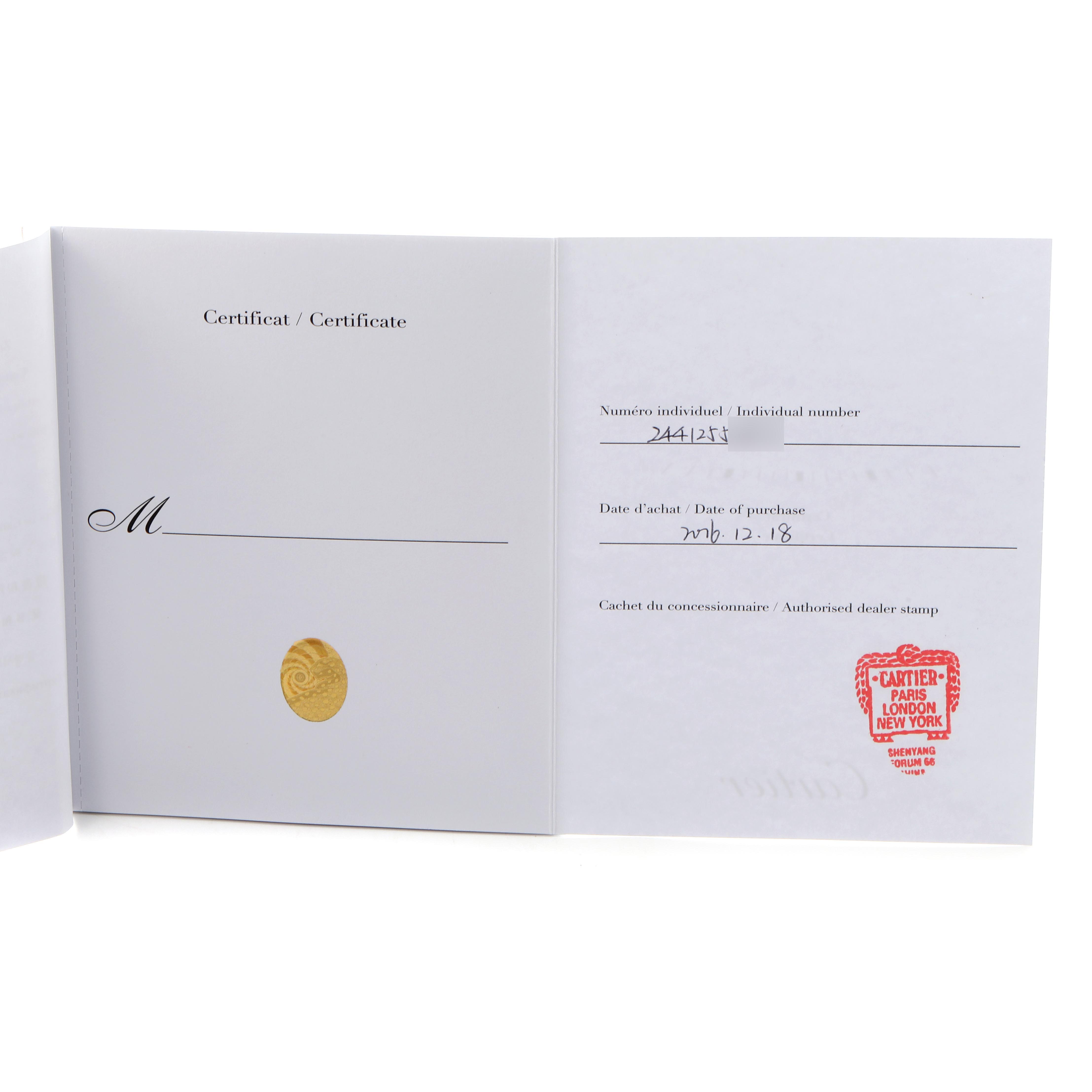 The image shows a certificate booklet for the Cartier Tank Louis W1529756 Men's Yellow Gold Silver Dial W1529756 Men's Yellow Gold Silver Dial watch, featuring purchase details and dealer stamp.