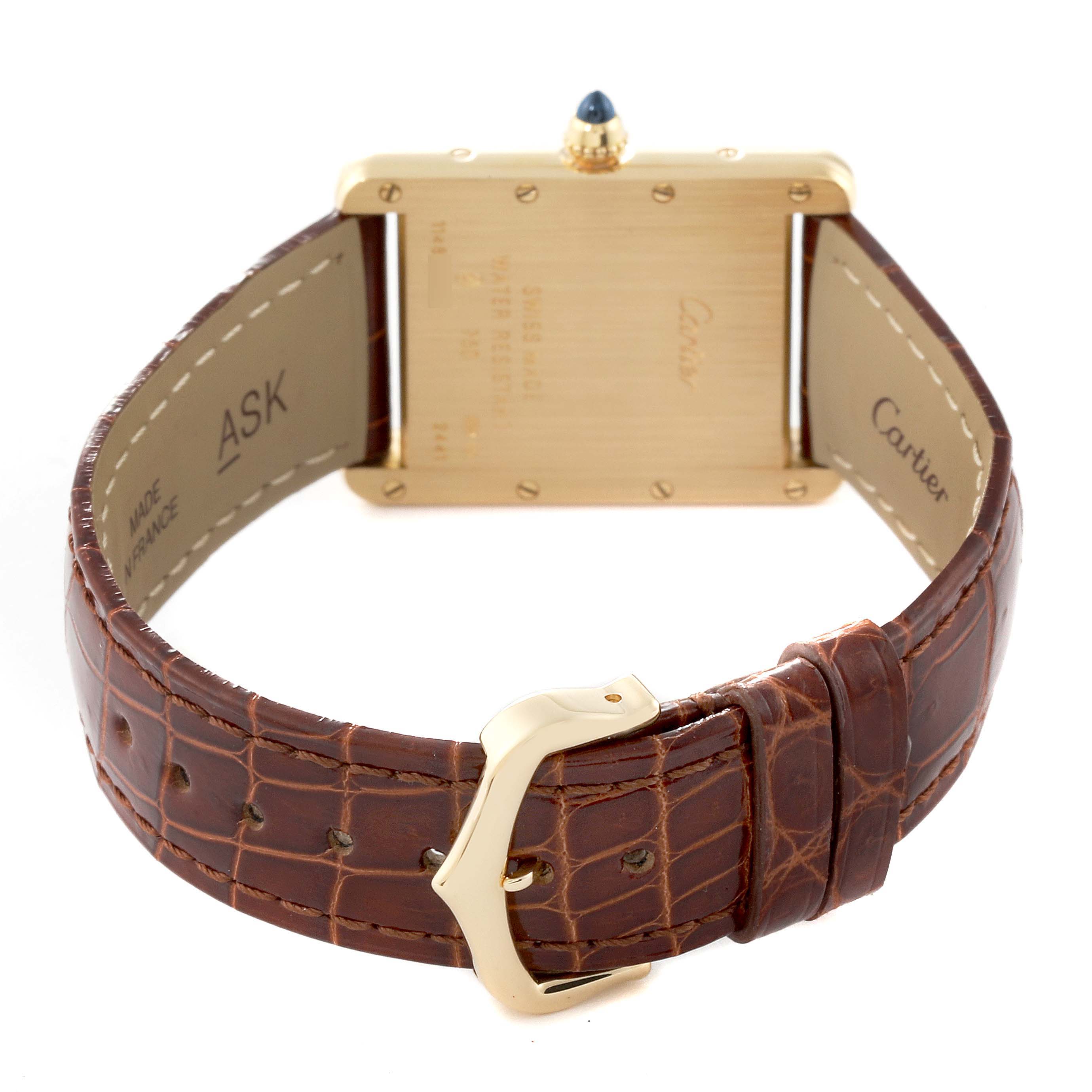 The image shows the back view of the Cartier Tank Louis W1529756 Men's Yellow Gold Silver Dial W1529756 Men's Yellow Gold Silver Dial watch, highlighting its brown leather strap and golden buckle.