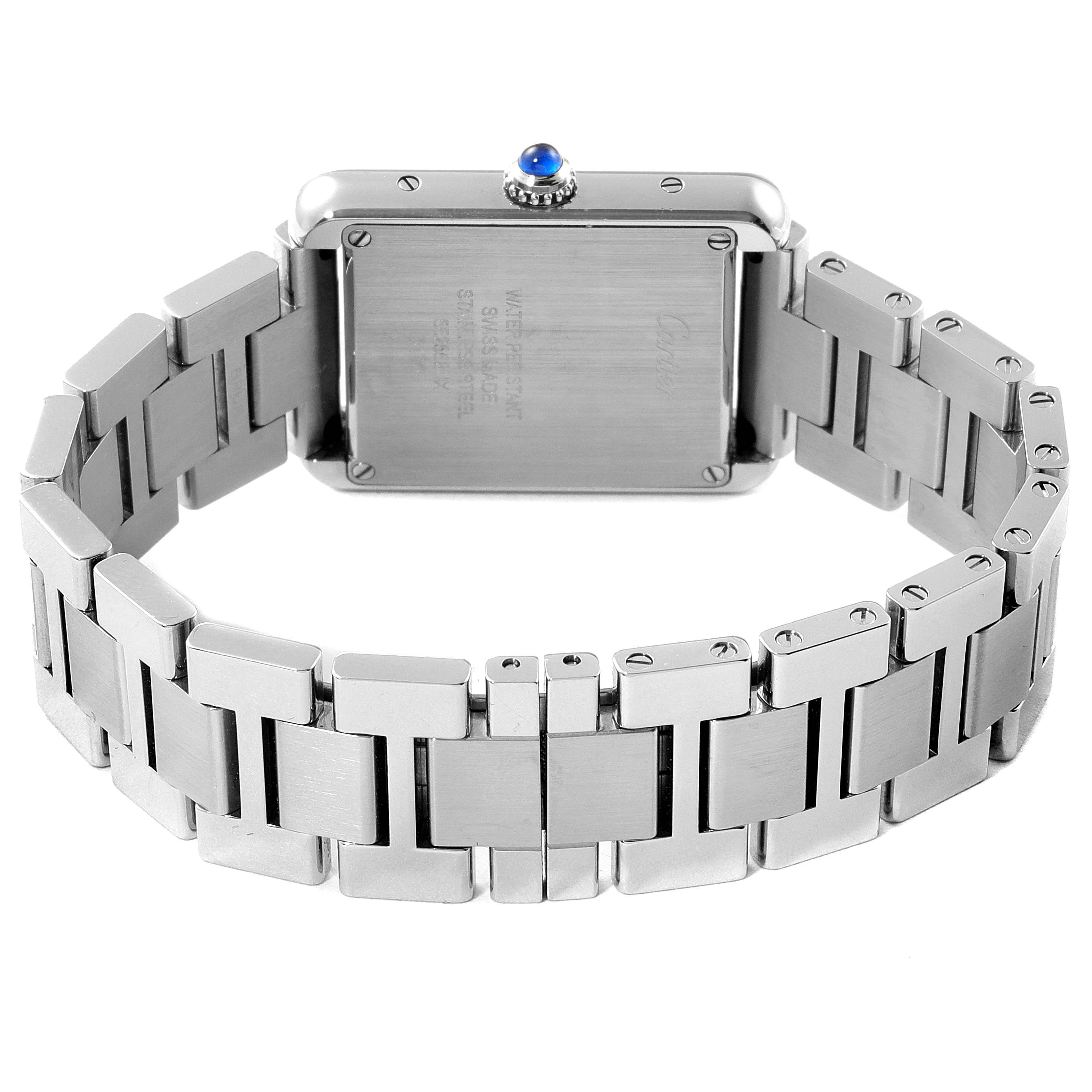 The image shows the back view of a Cartier Tank Solo W5200013 Women's Stainless Steel Silver Dial W5200013 Women's Stainless Steel Silver Dial watch, highlighting its stainless steel case and bracelet.