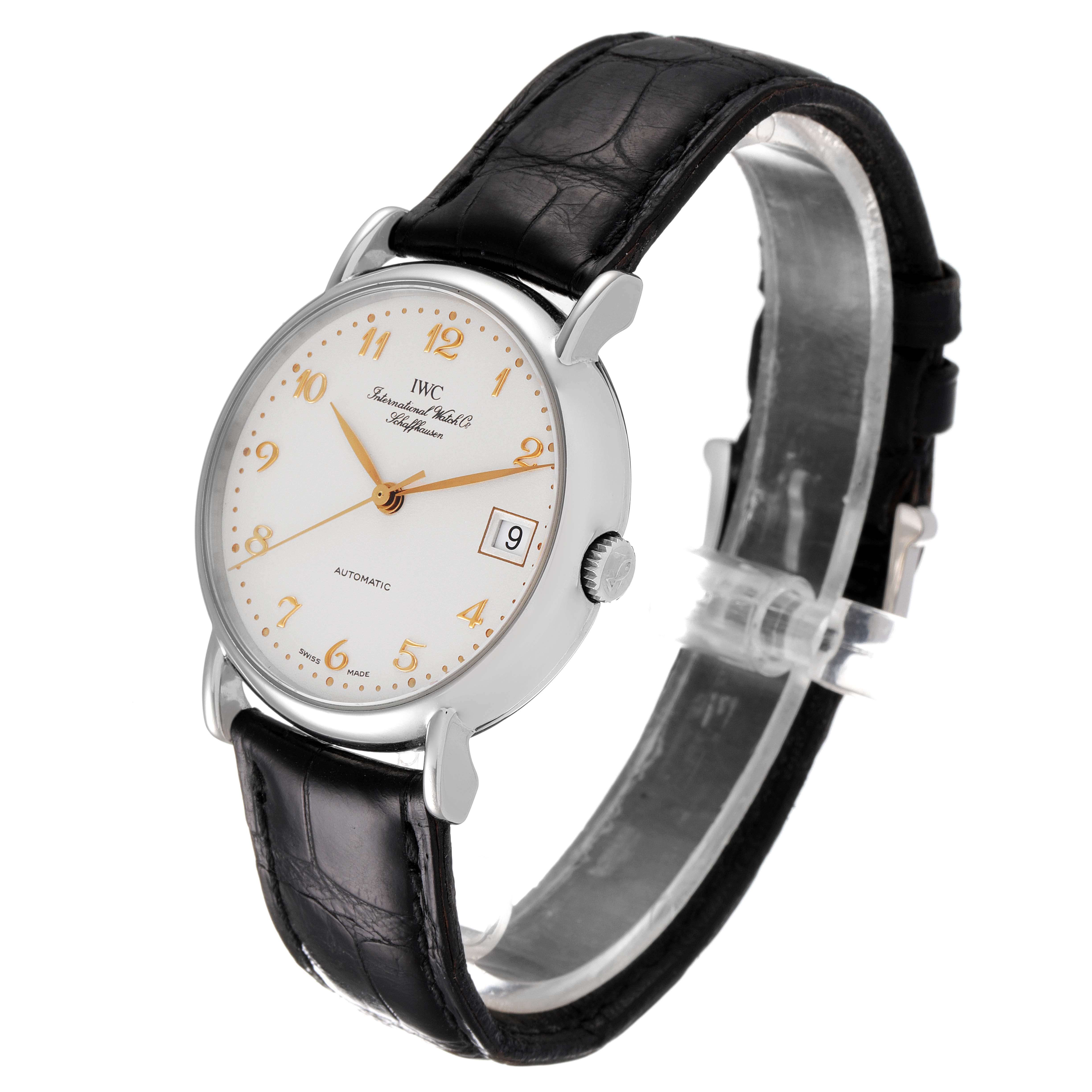 The image shows an angled view of an IWC Portofino IW351323 Men's Stainless Steel Silver Dial IW351323 Men's Stainless Steel Silver Dial watch, featuring a round white dial, gold numerals, date display, and black leather strap.