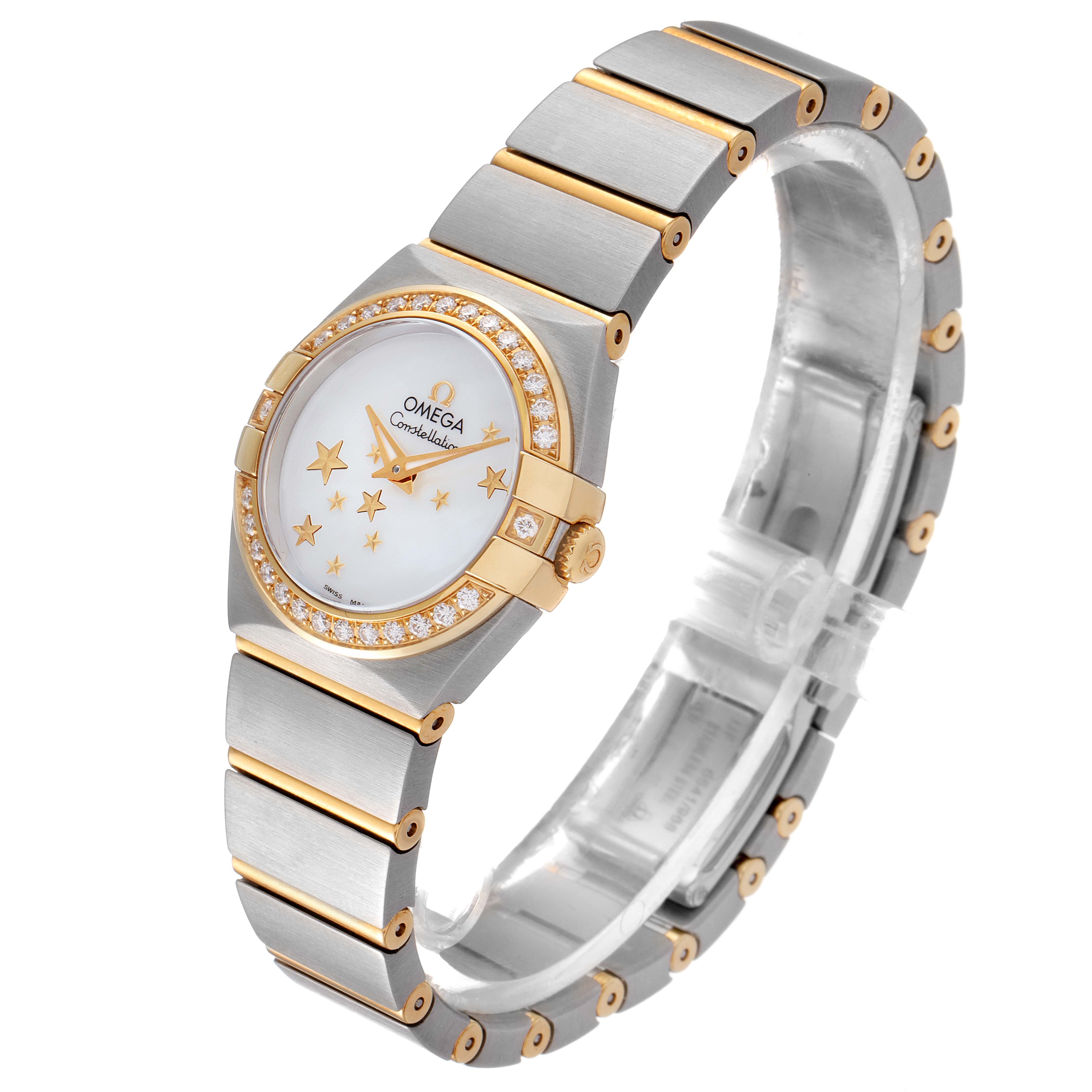 The image shows an Omega 123.25.24.60.05.001 Women
s Steel and Gold (two tone) Mother of Pearl Dial 123.25.24.60.05.001 Women
s Steel and Gold (two tone) Mother of Pearl Dial Constellation Star Steel Yellow Gold Diamond Watch model 123.25.24.60.05.001 at a front-side angle highlighting the bezel, dial, and bracelet.