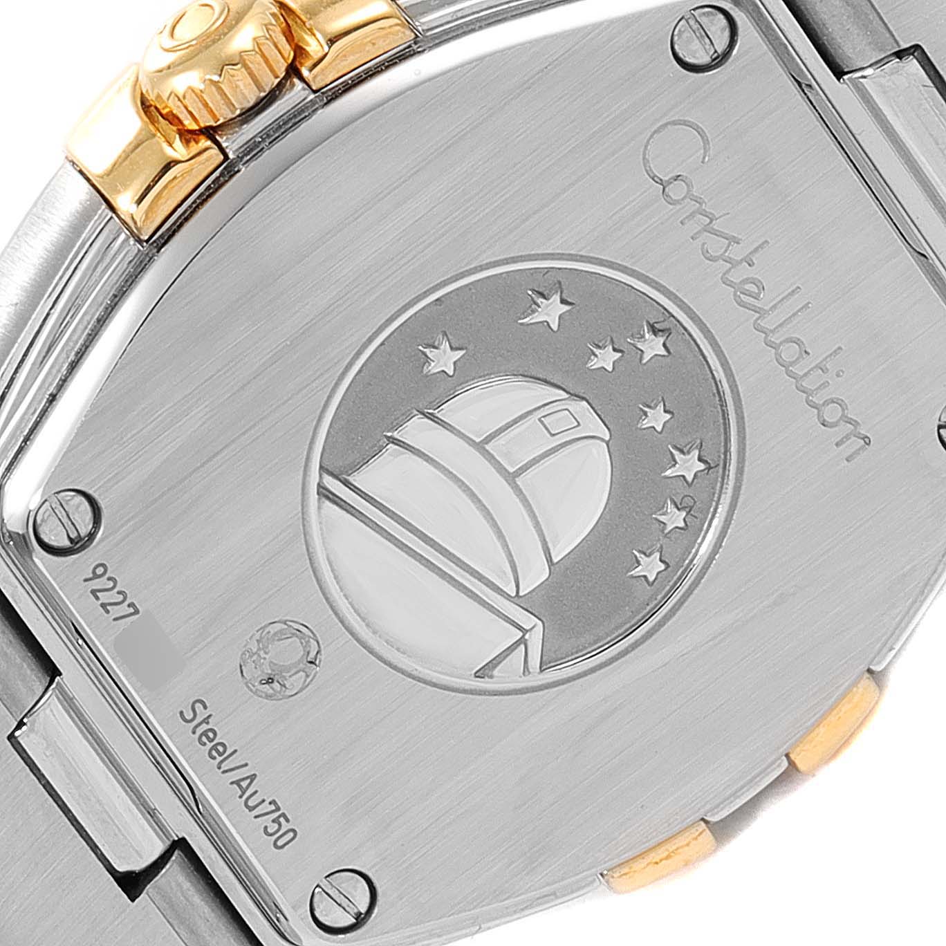 A close-up of the back case and crown of the Omega 123.25.24.60.05.001 Women
s Steel and Gold (two tone) Mother of Pearl Dial 123.25.24.60.05.001 Women
s Steel and Gold (two tone) Mother of Pearl Dial Constellation Star Steel Yellow Gold Diamond Watch model 123.25.24.60.05.001.