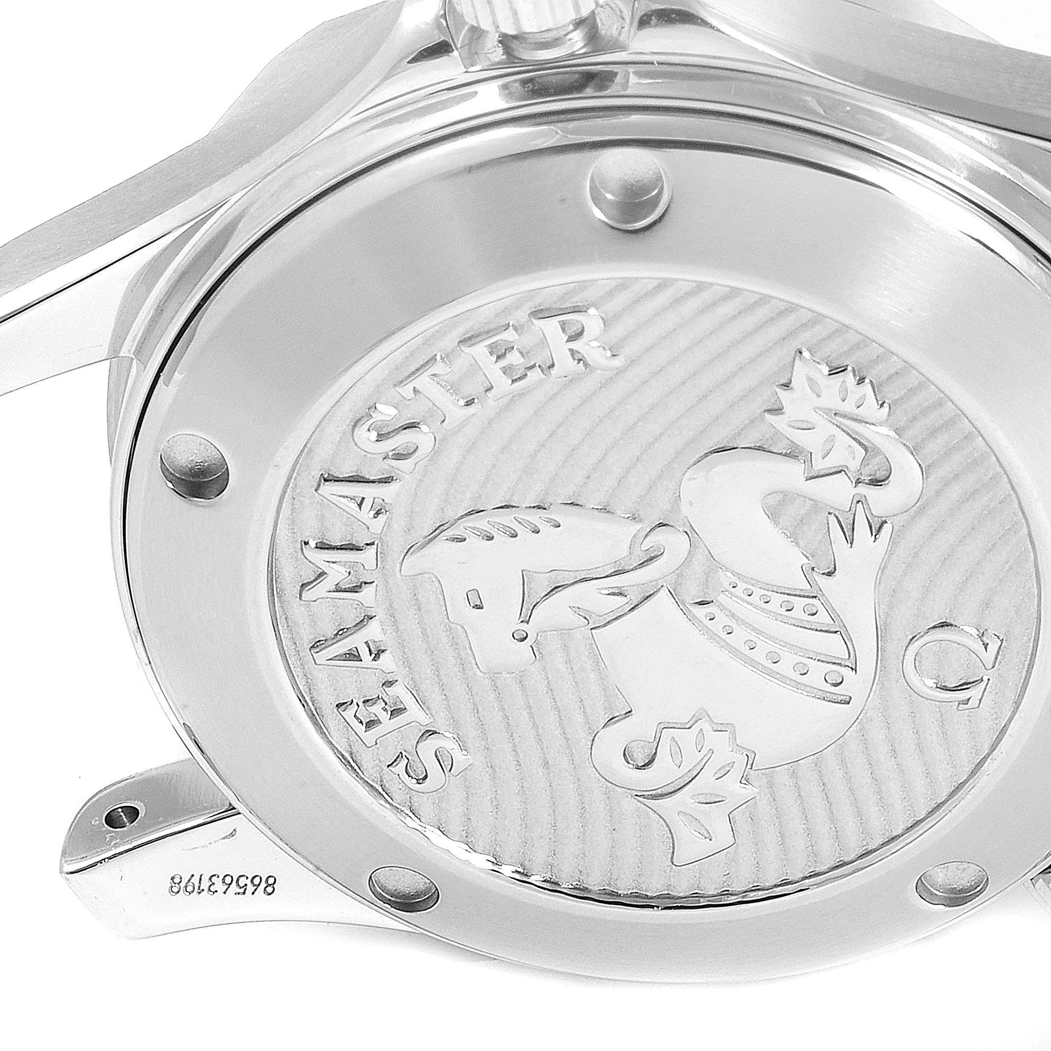 The image shows the engraved case back of an Omega Seamaster 212.30.36.20.01.002 Men
s Stainless Steel Black Dial 212.30.36.20.01.002 Men
s Stainless Steel Black Dial watch from a roughly horizontal angle.