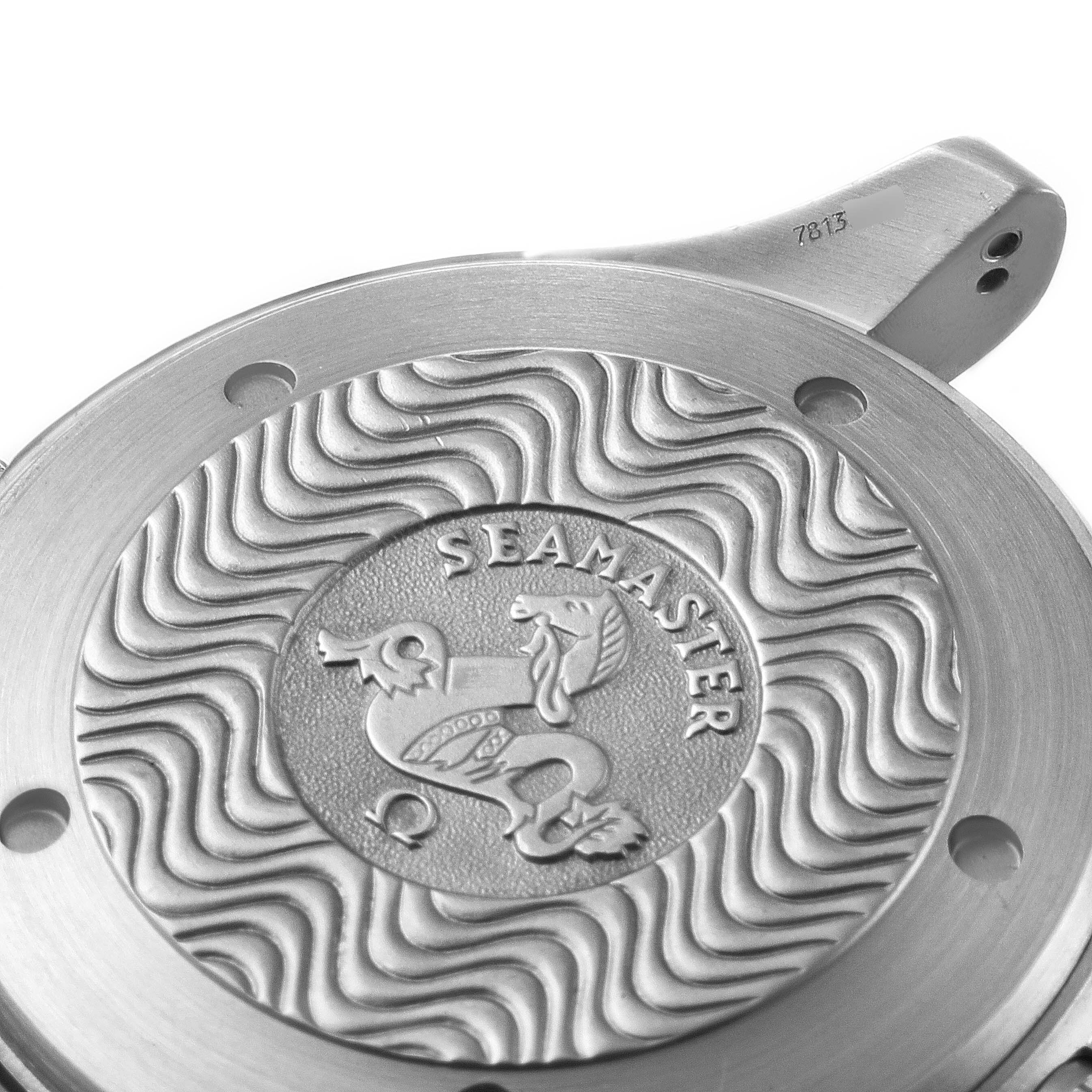 The image shows the case back of an Omega Seamaster 2294.52.00 Men's Titanium Black Dial 2294.52.00 Men's Titanium Black Dial watch, featuring a wave pattern and the Seamaster logo.