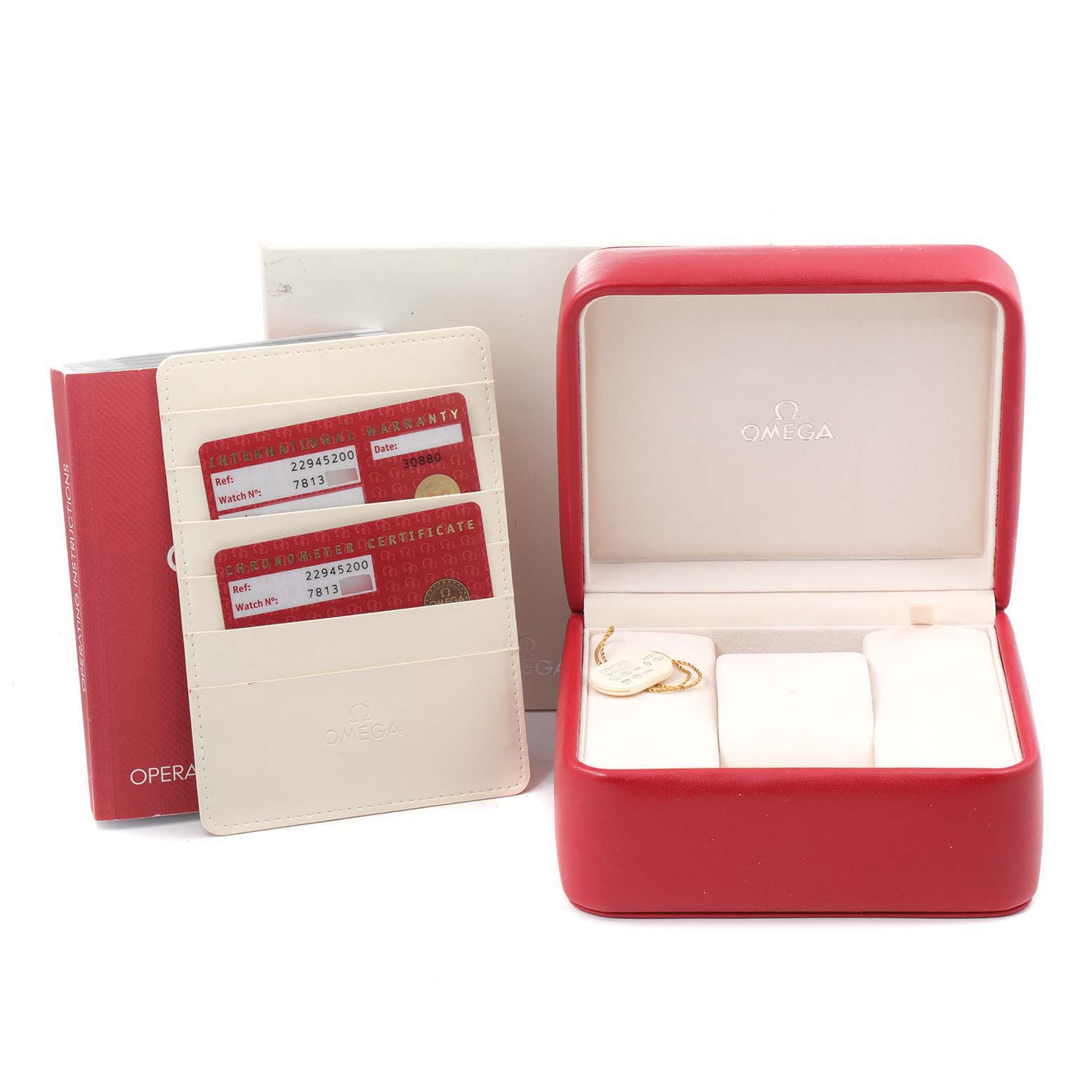 This image shows the Omega Seamaster 2294.52.00 Men's Titanium Black Dial 2294.52.00 Men's Titanium Black Dial watch accessories, including the box, warranty cards, and a certificate holder, from a frontal angle.