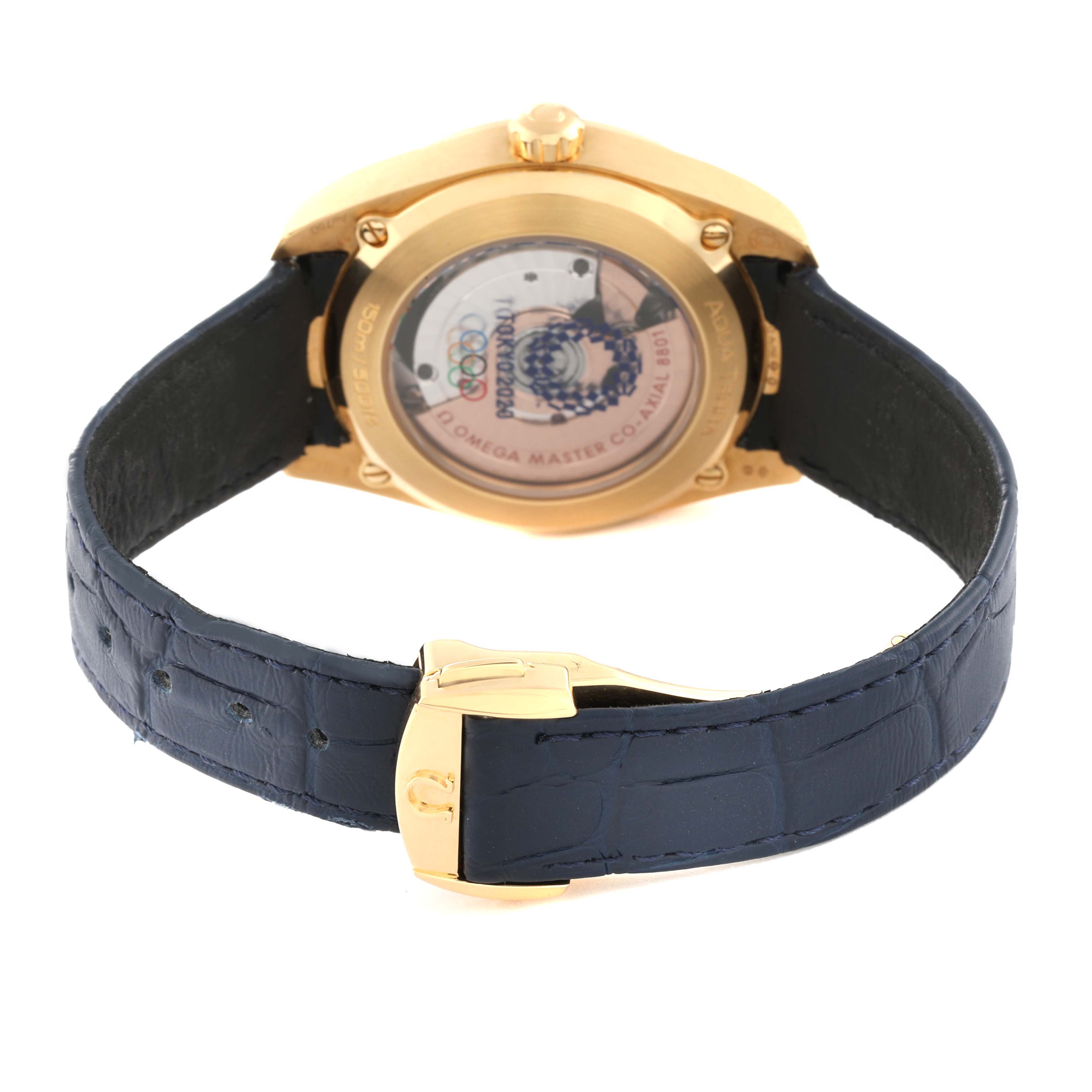 The Omega Aqua Terra 522.53.38.20.03.001 Men's Yellow Gold Blue Dial 522.53.38.20.03.001 Men's Yellow Gold Blue Dial watch is shown from the rear, displaying its case back and blue leather strap with a gold clasp.