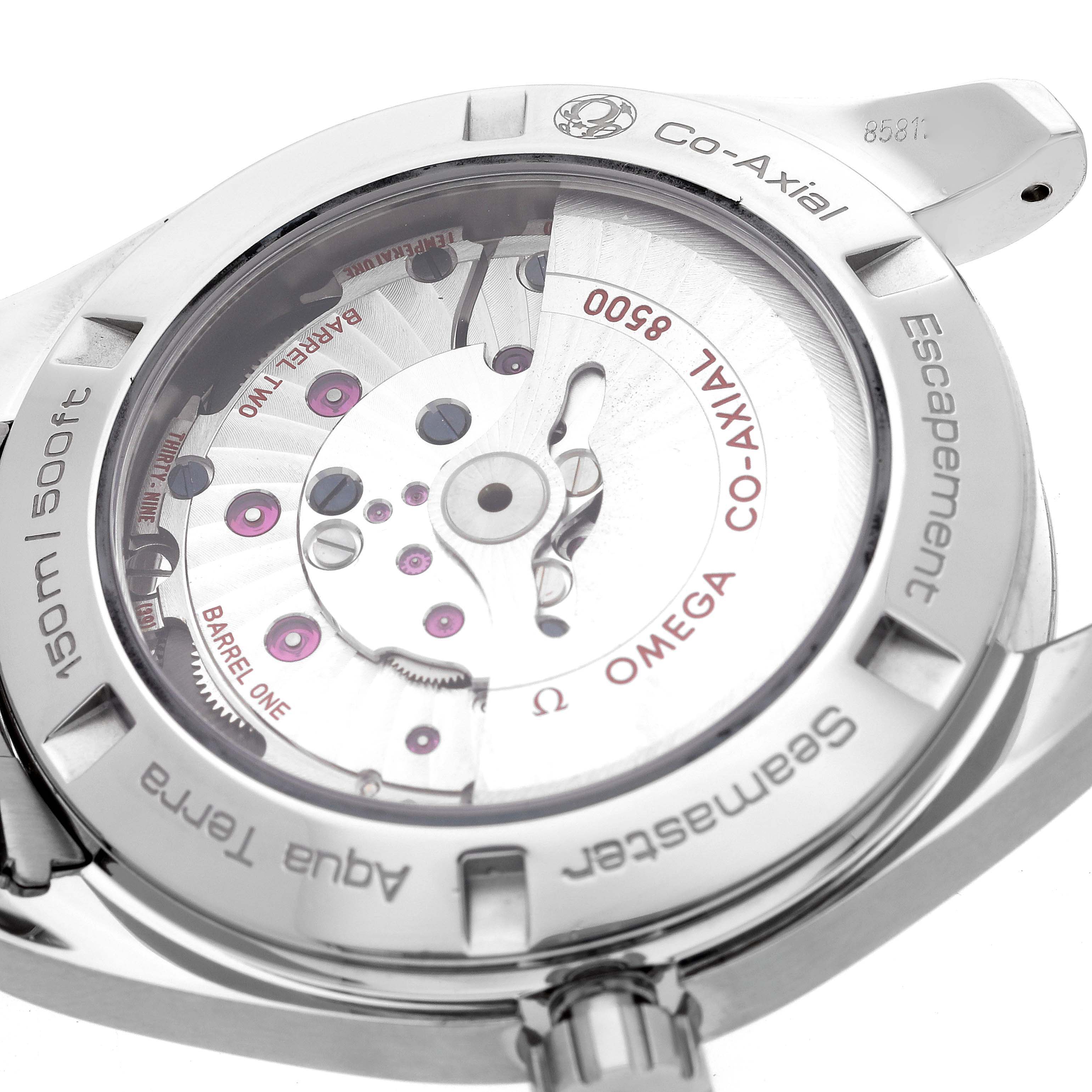 The image shows the back of the Omega Aqua Terra 231.10.42.21.02.002 Men
s Stainless Steel Silver Dial 231.10.42.21.02.002 Men
s Stainless Steel Silver Dial watch, highlighting its Co-Axial escapement and internal movement.