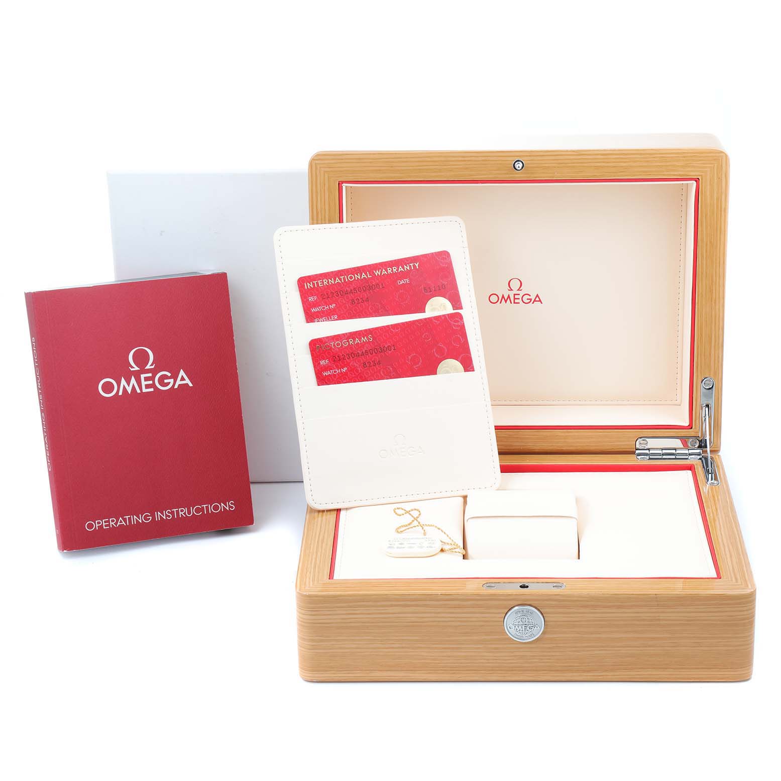 The image shows an Omega Seamaster 212.30.44.50.03.001 Men
s Stainless Steel Blue Dial 212.30.44.50.03.001 Men
s Stainless Steel Blue Dial watch box, warranty cards, instructions, and tag, viewed from the front and slightly above.