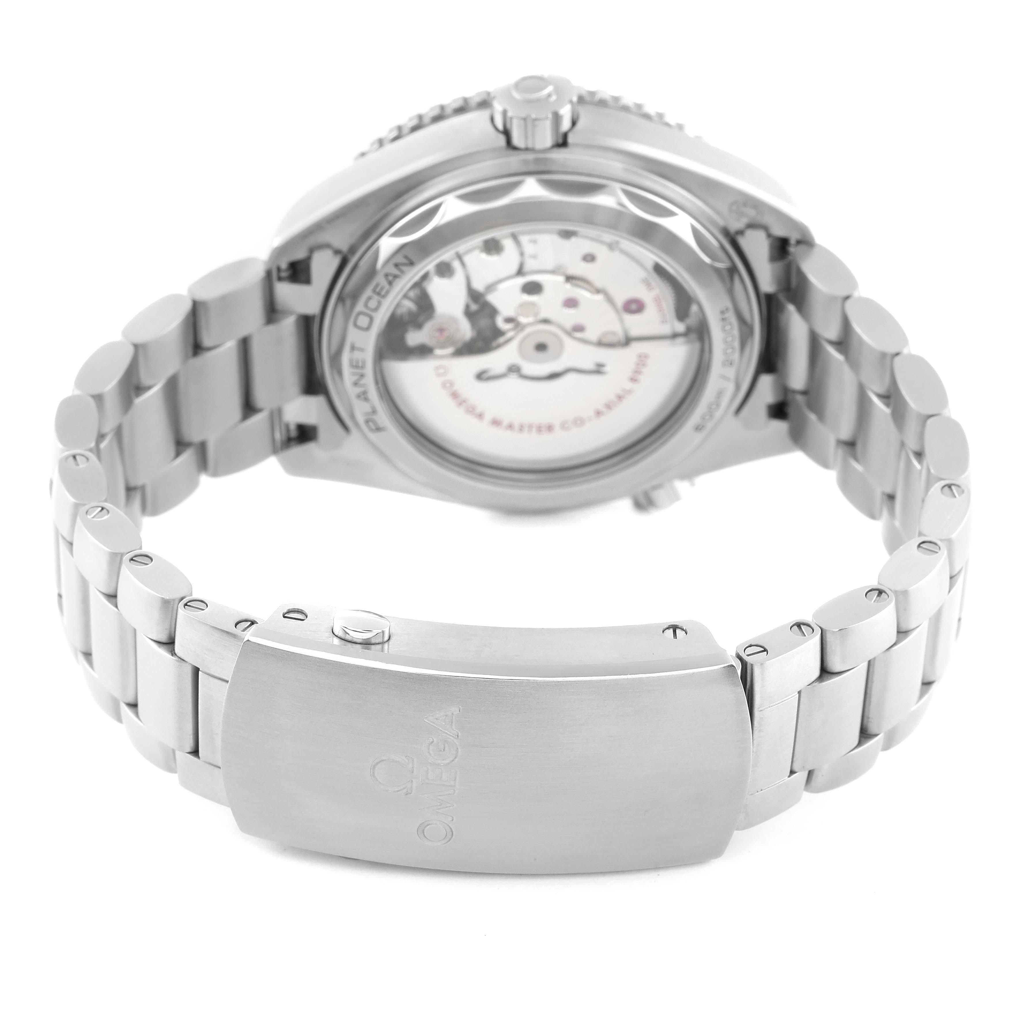 The image shows the Omega Planet Ocean 215.30.44.21.01.001 Men
s Stainless Steel Black Dial 215.30.44.21.01.001 Men
s Stainless Steel Black Dial watch
s back view, highlighting its bracelet, clasp, and transparent case back displaying the movement.