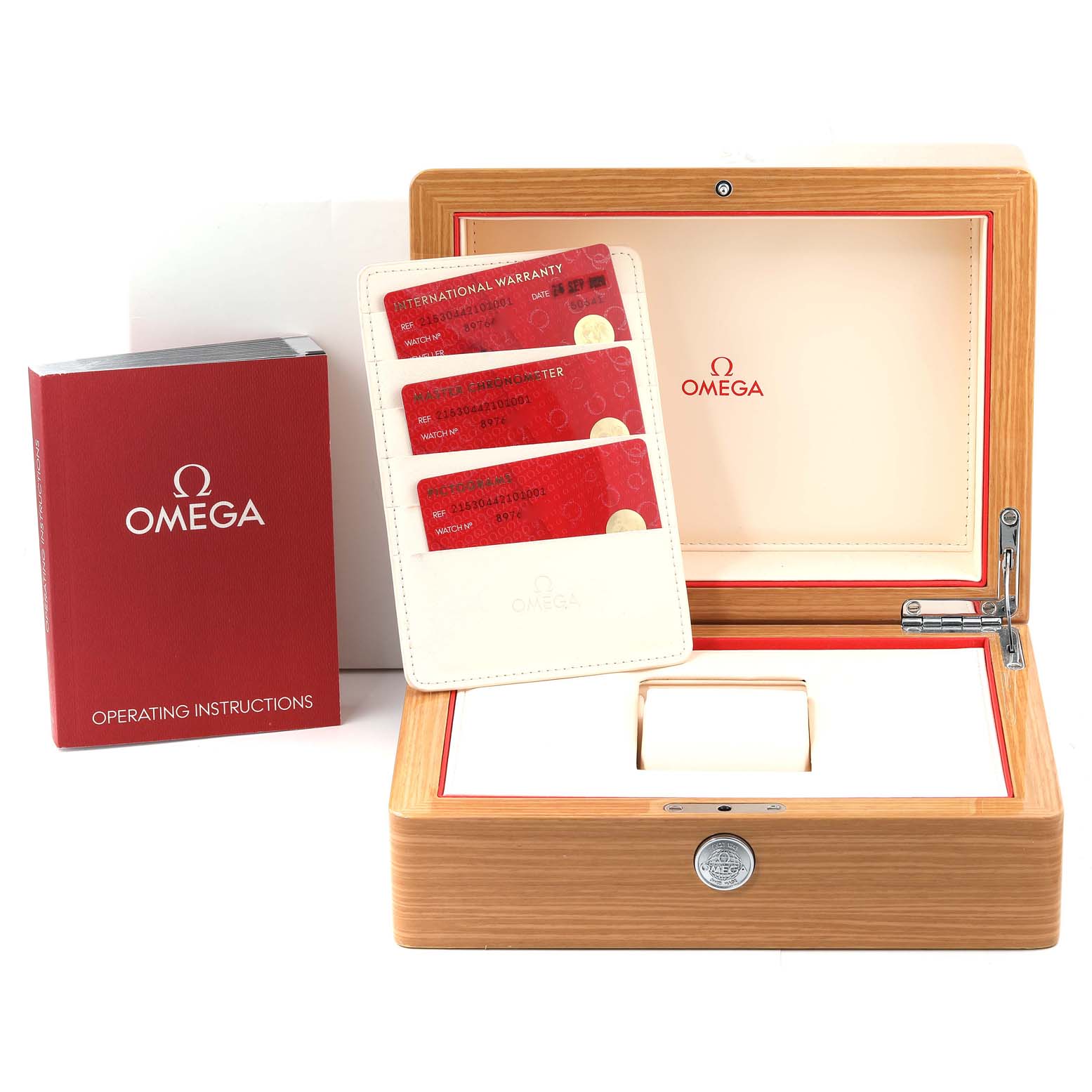 This image shows the Omega Planet Ocean 215.30.44.21.01.001 Men
s Stainless Steel Black Dial 215.30.44.21.01.001 Men
s Stainless Steel Black Dial watch
s accessories, including the wooden box, international warranty cards, and operating instructions.