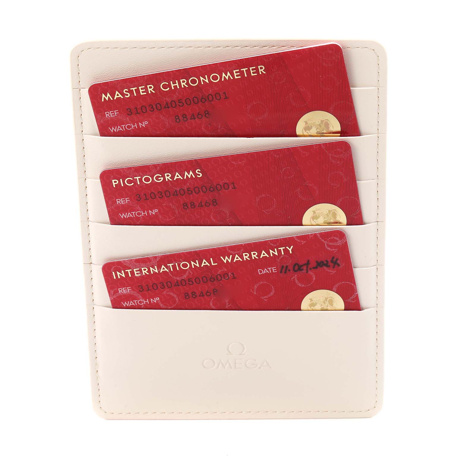 The image shows Omega Speedmaster 310.30.42.50.04.001 Men
s Stainless Steel Black Dial 310.30.42.50.04.001 Men
s Stainless Steel Black Dial model cards for Master Chronometer, Pictograms, and International Warranty, angled in a cardholder.