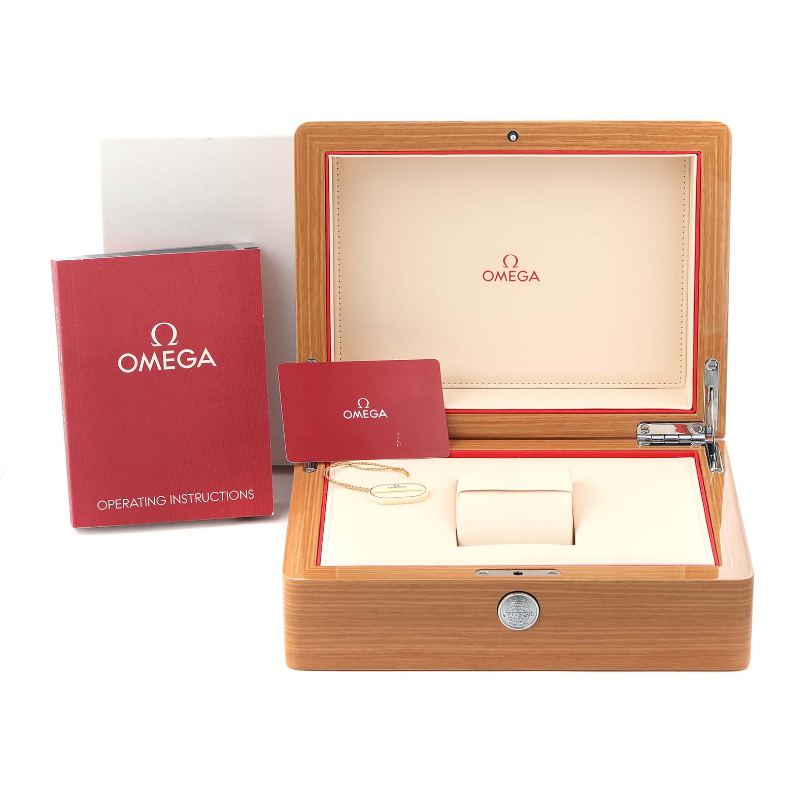 The image shows an open Omega Speedmaster 311.30.42.30.01.004 Men's Stainless Steel Black Dial 311.30.42.30.01.004 Men's Stainless Steel Black Dial watch box, instruction booklet, and a card, all neatly arranged.