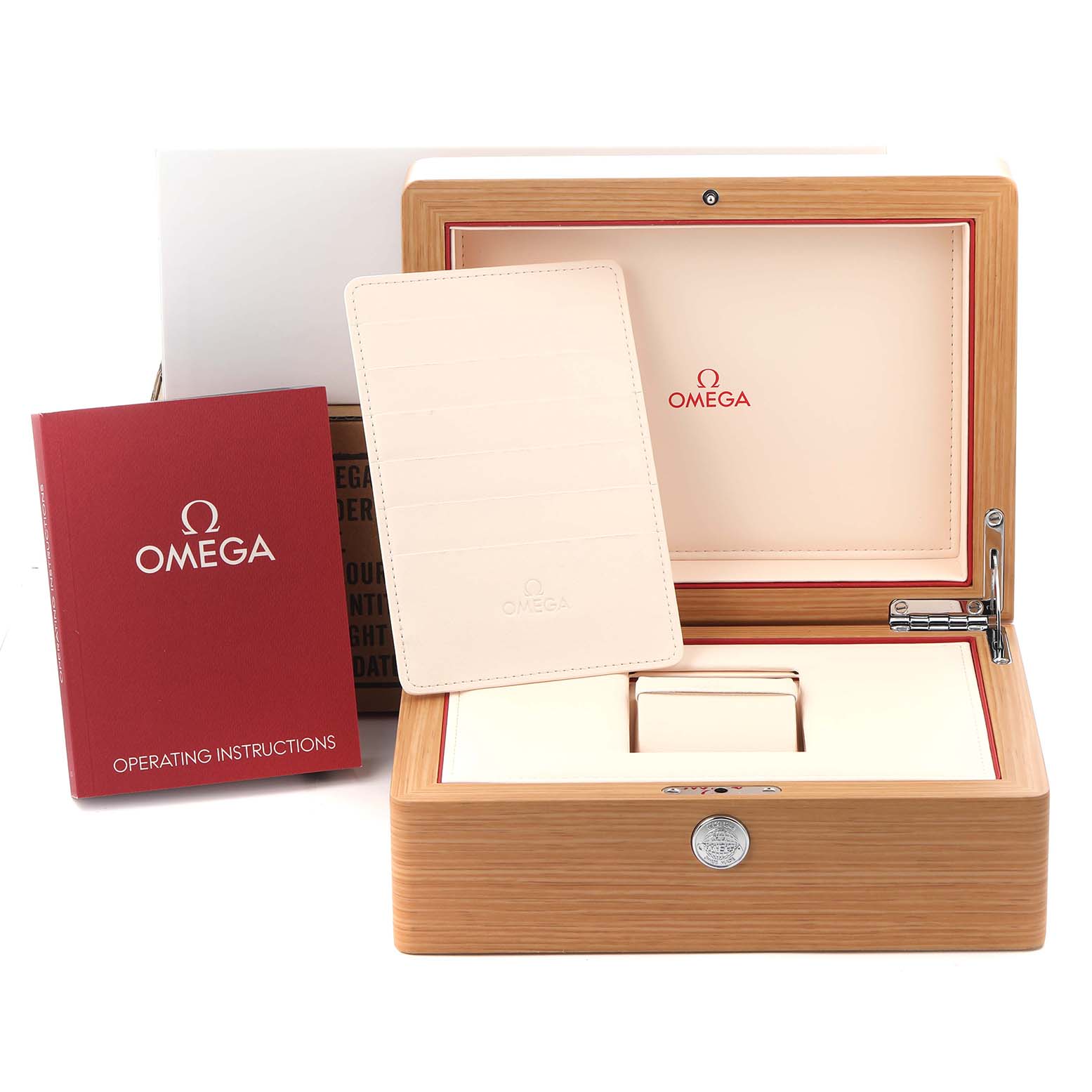 The image shows an Omega Speedmaster 3559.32.00 Men's Stainless Steel White Dial 3559.32.00 Men's Stainless Steel White Dial box and accessories, including the operating instructions and cardholder, from a top angle.