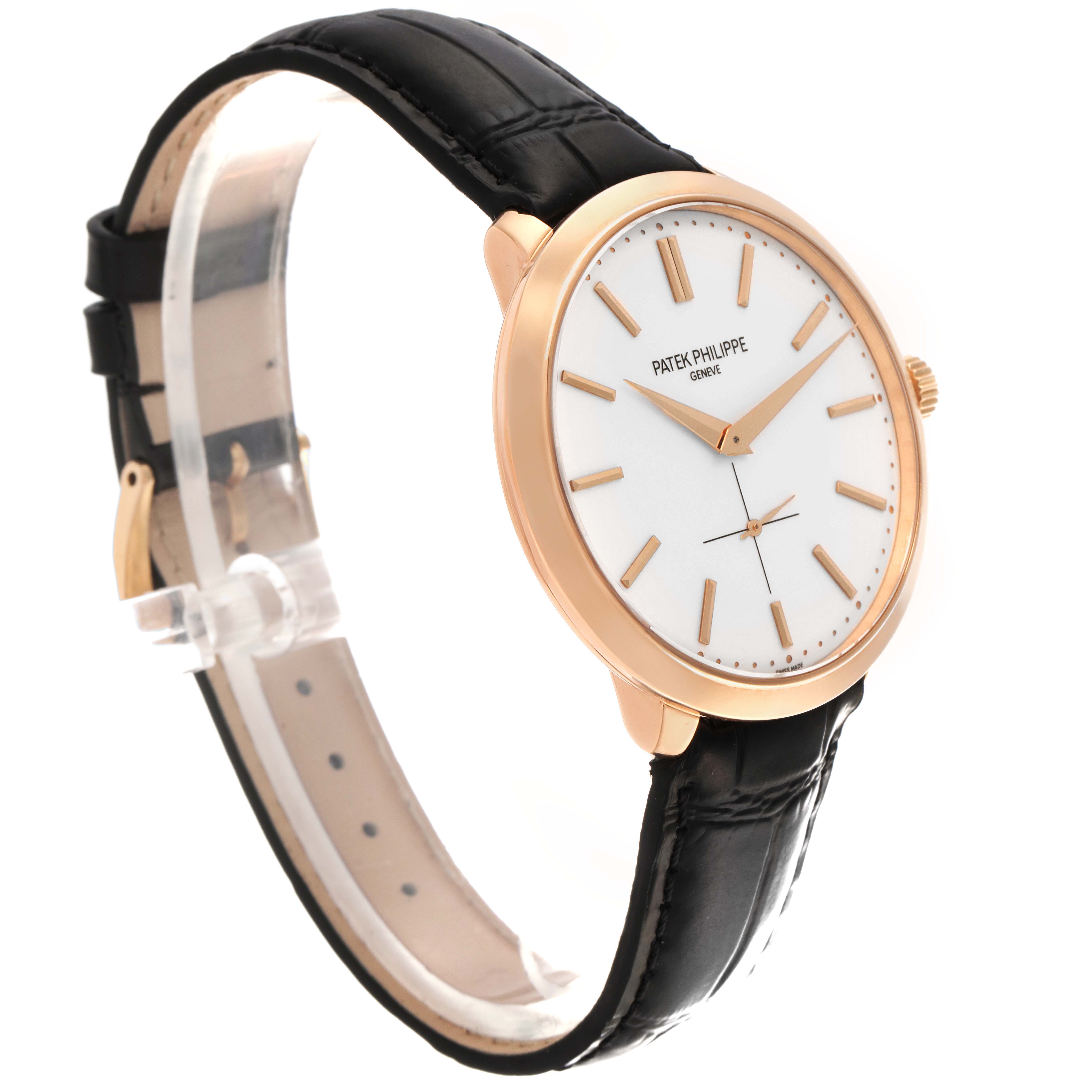 The Patek Philippe Calatrava 5123R-001 Men
s Rose Gold Silver Dial 5123R-001 Men
s Rose Gold Silver Dial watch is shown at a three-quarter angle, highlighting its dial, case, crown, and leather strap.
