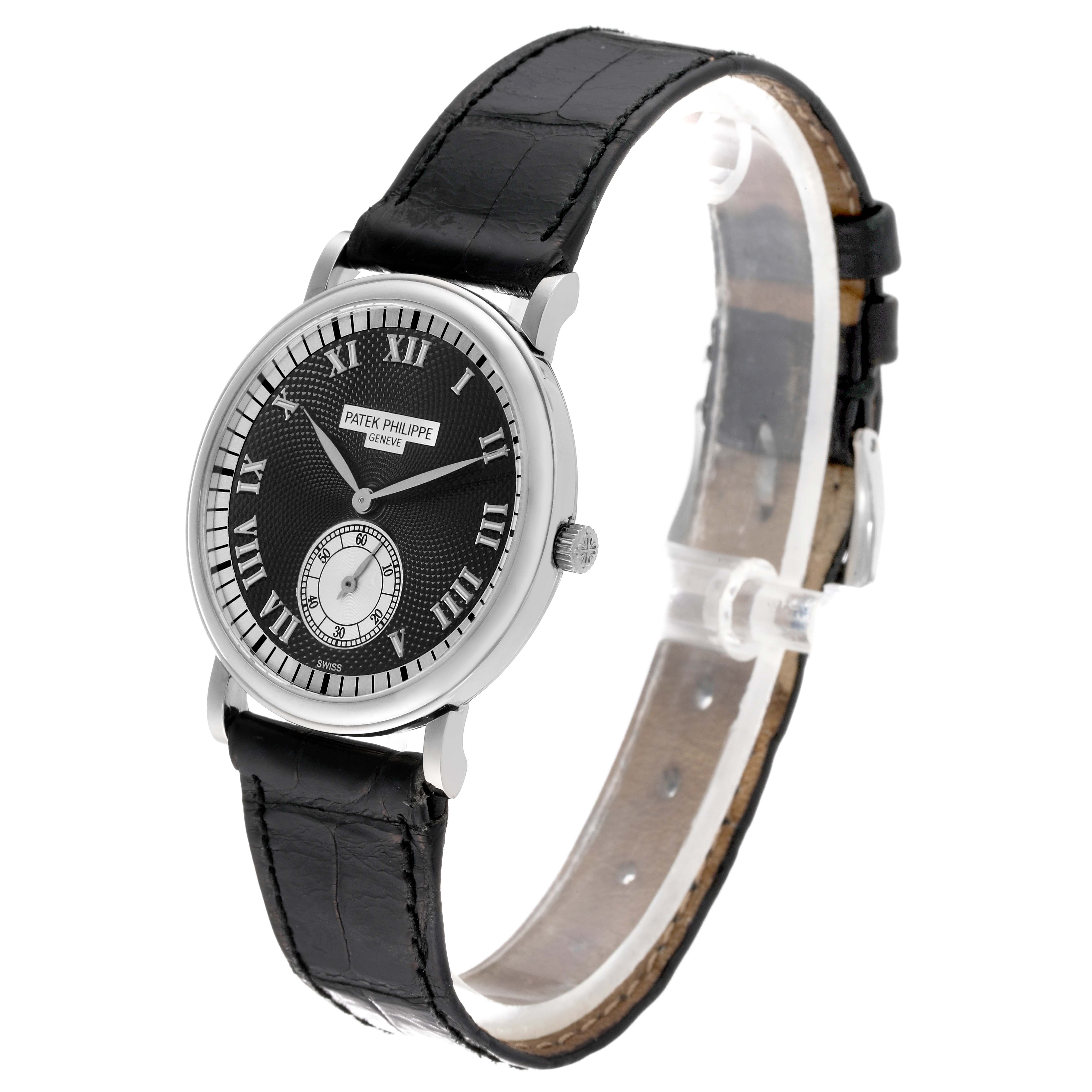 This image shows a side/front view of the Patek Philippe Calatrava 5022G Men's White Gold Black Dial 5022G Men's White Gold Black Dial watch, highlighting the dial, crown, and black leather strap.