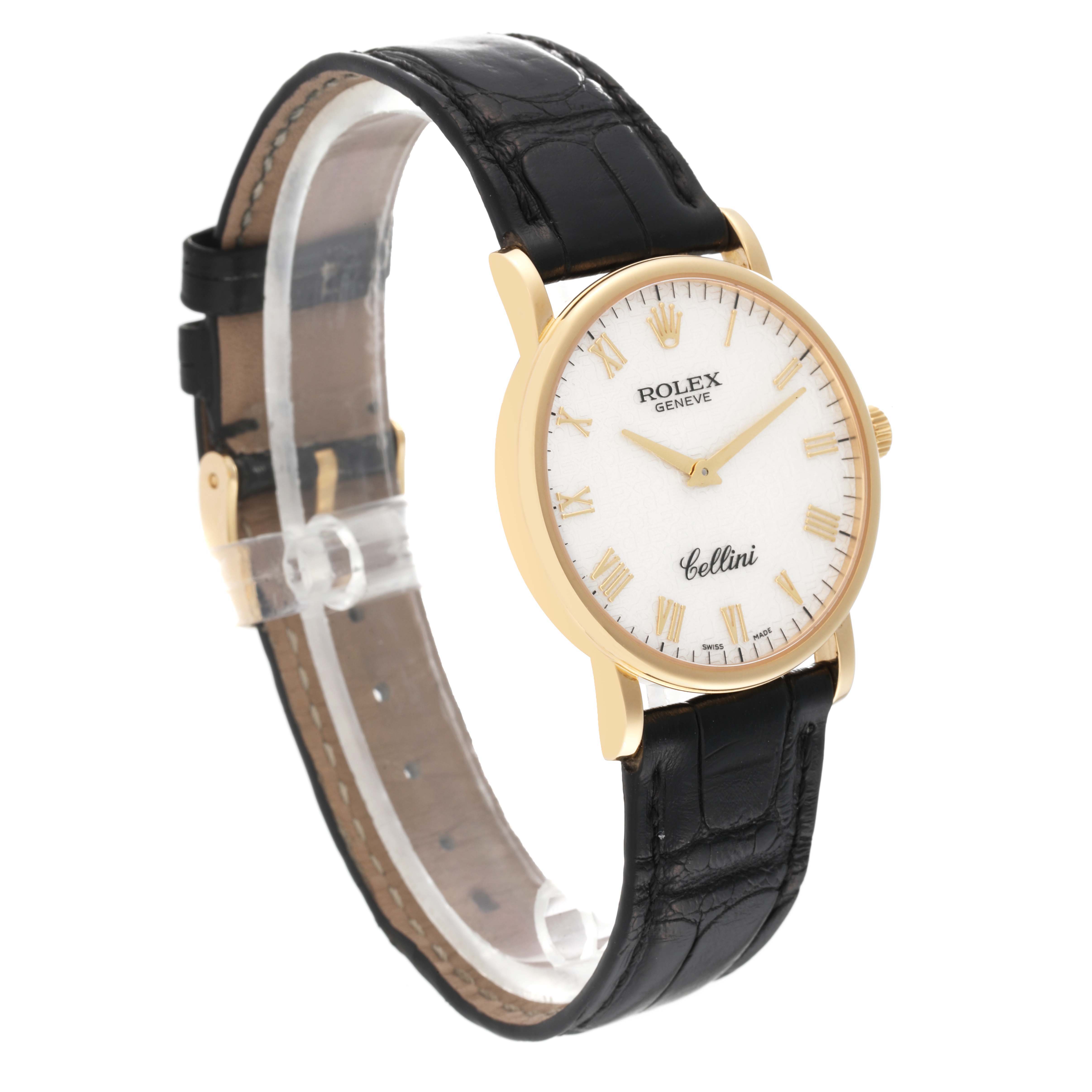 The Rolex Cellini 5115 Men's Yellow Gold White Dial 5115 Men's Yellow Gold White Dial watch is shown at a three-quarter angle, highlighting its gold case, white dial, and black leather strap.