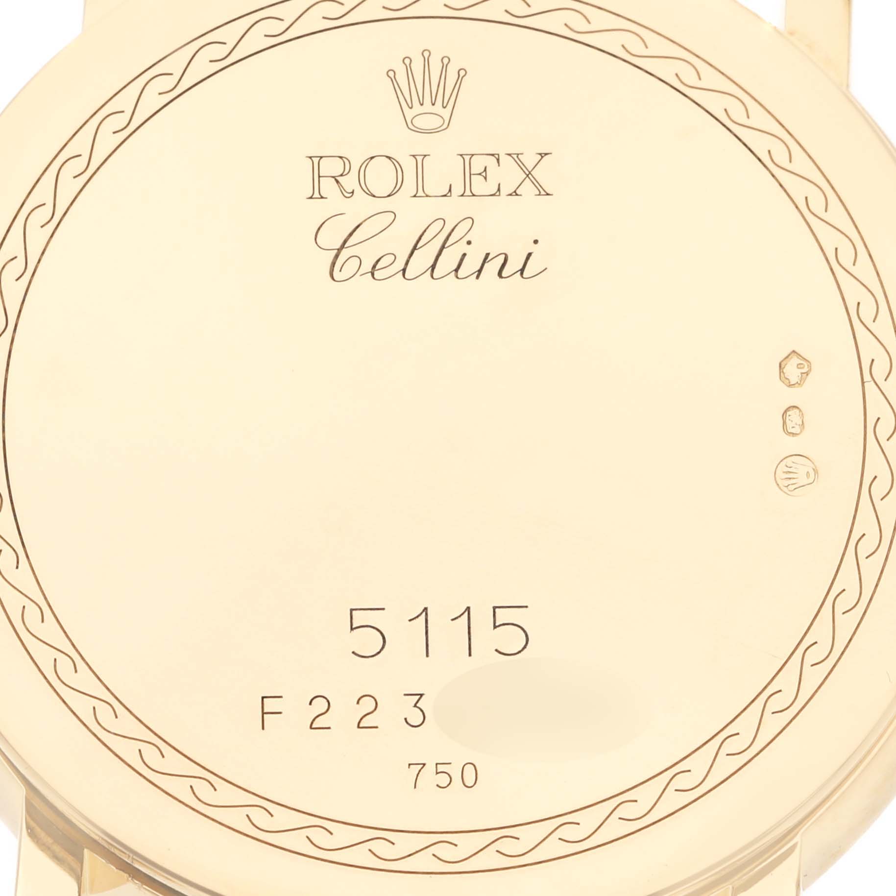 This image shows the back of a Rolex Cellini 5115 Men's Yellow Gold White Dial 5115 Men's Yellow Gold White Dial watch, detailing the model number 5115, series F223, and 750 gold purity hallmark.