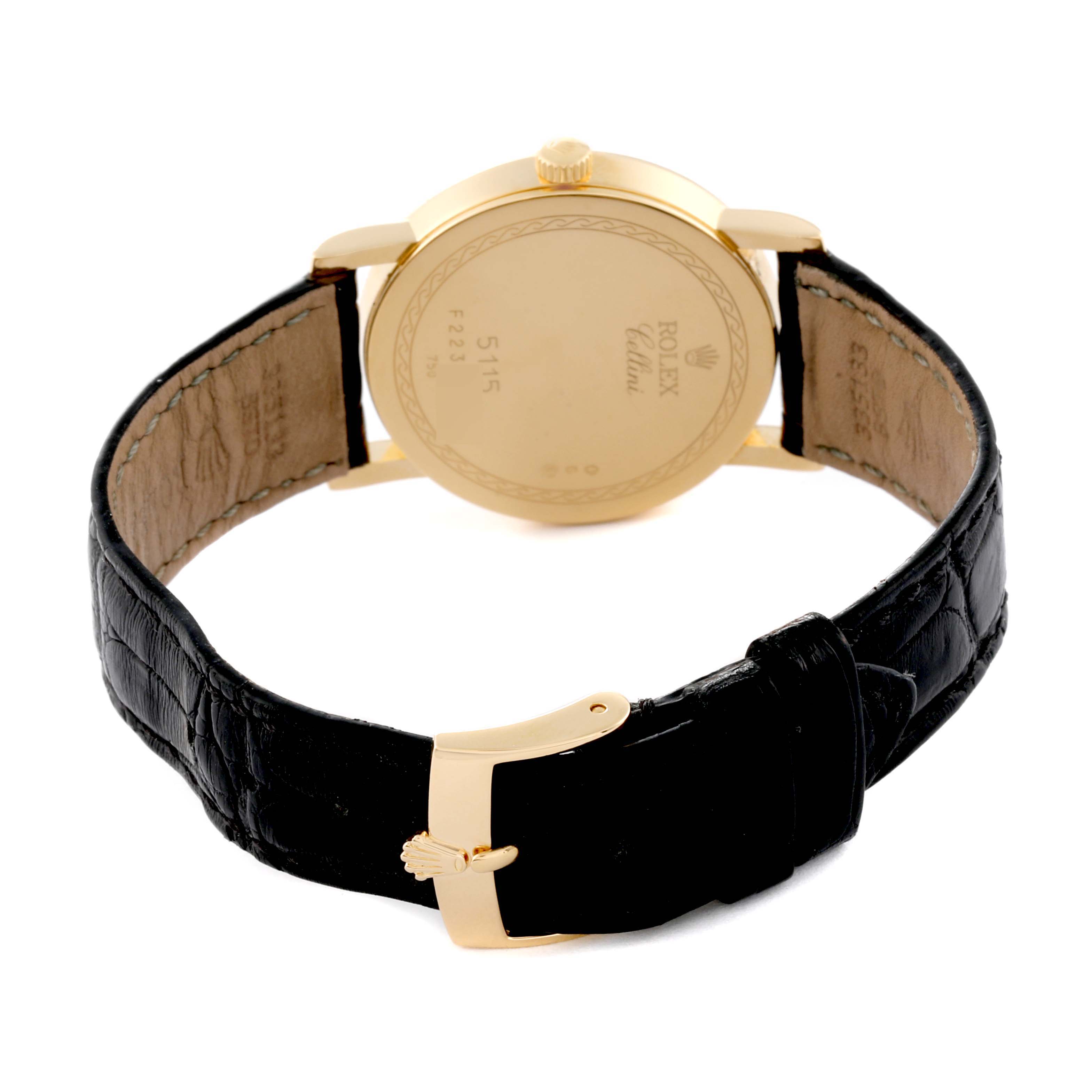The image shows the back view of a Rolex Cellini 5115 Men's Yellow Gold White Dial 5115 Men's Yellow Gold White Dial watch, highlighting its golden case, leather strap, and clasp.